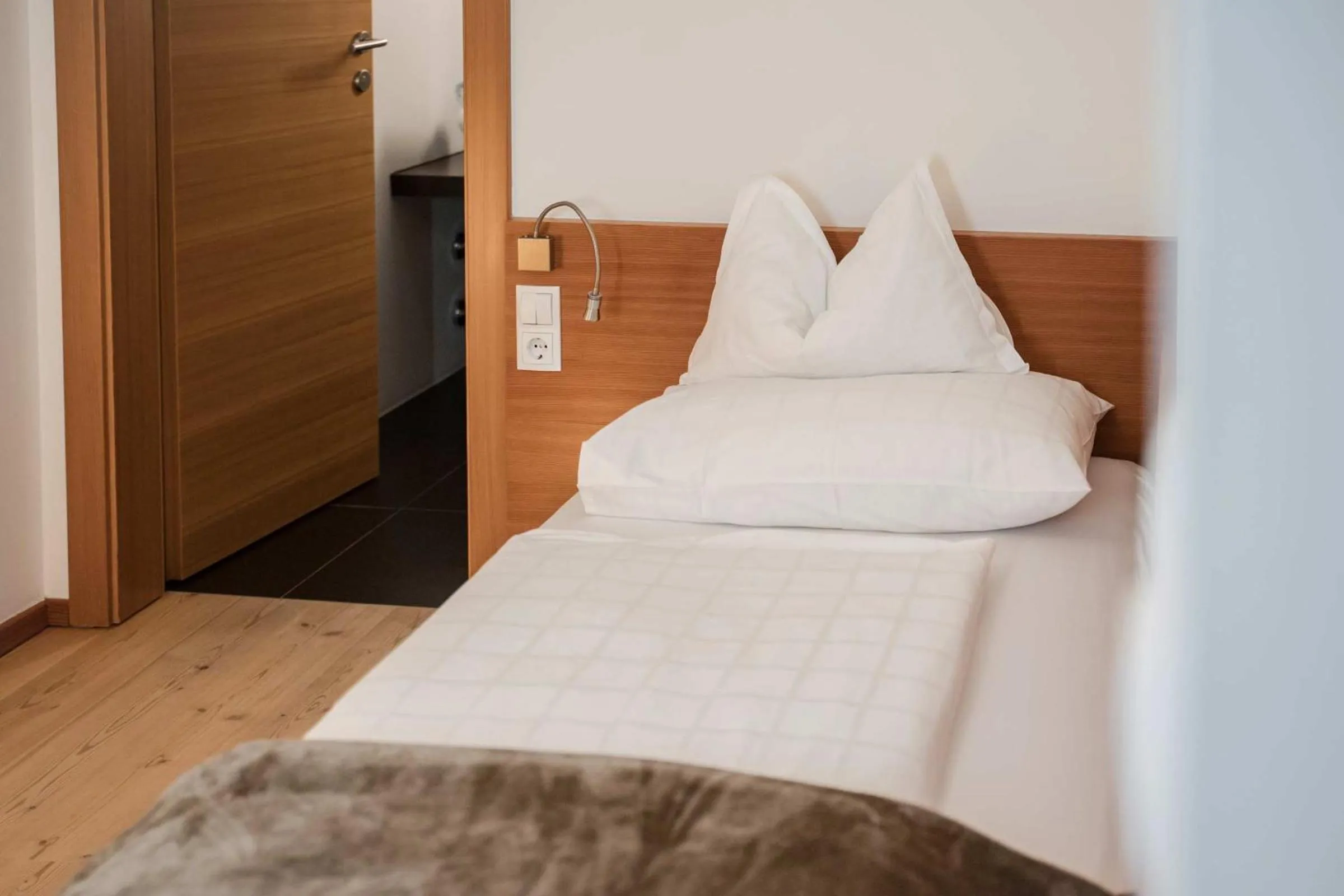 Bed in Farmhotel Moosmair