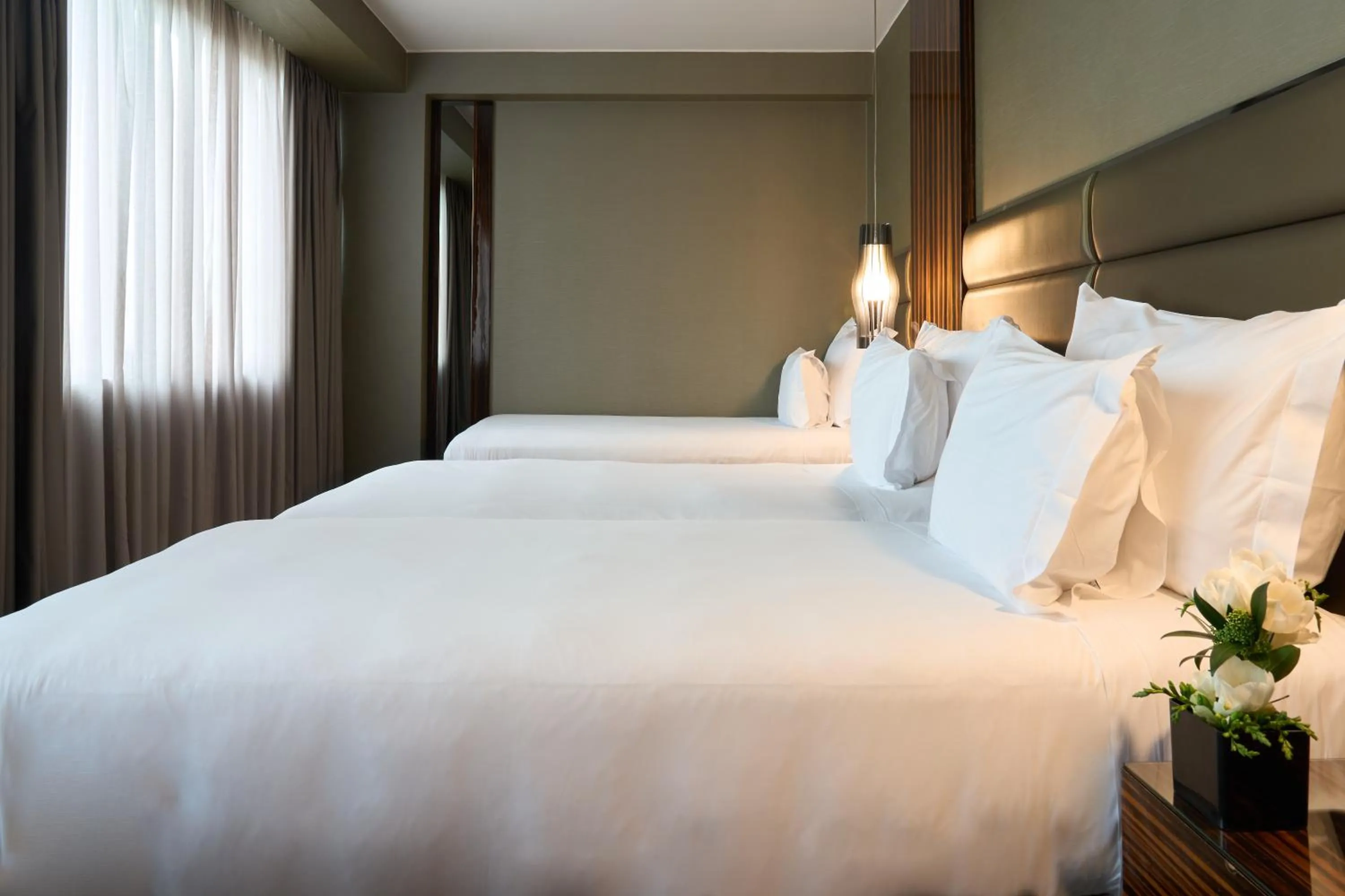 Bed in Altis Grand Hotel