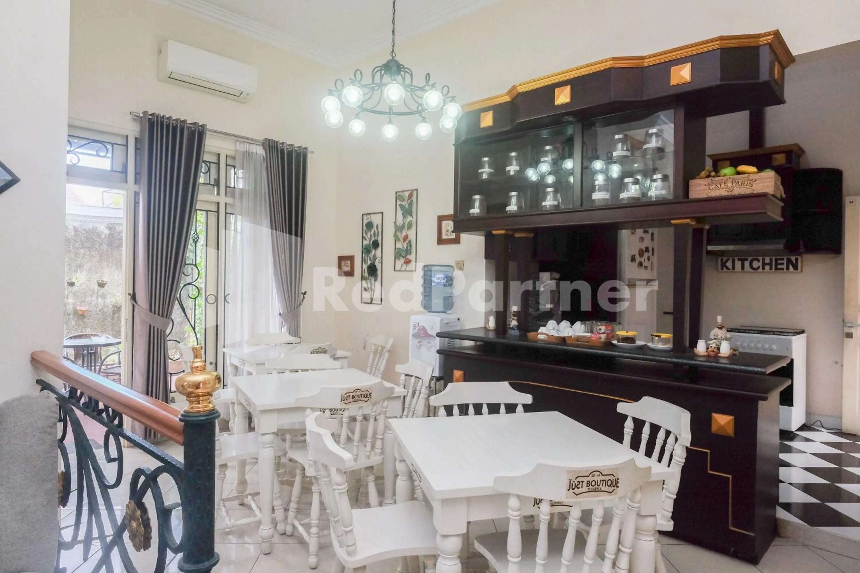 Seating area in Just 11 Boutique Syariah Mitra RedDoorz near UGM Yogyakarta