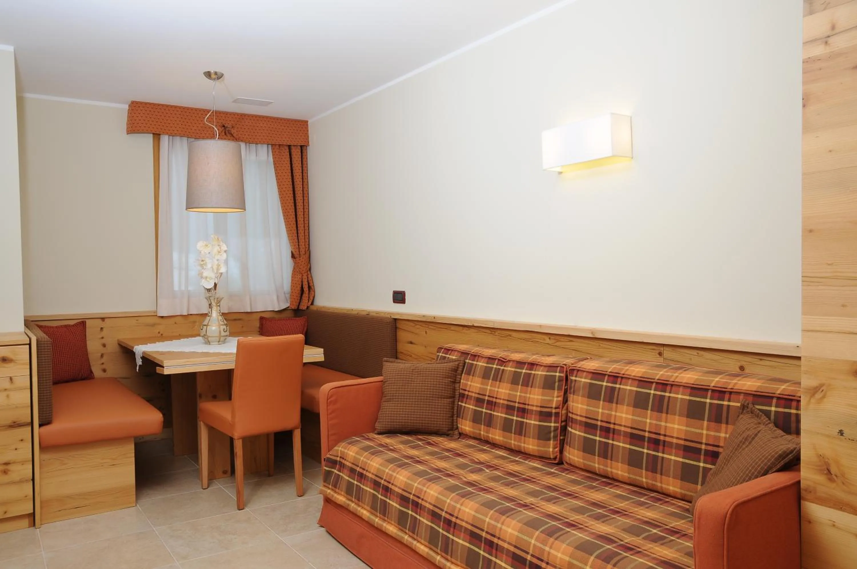 Living room in Residence Marisol Camere & Appartamenti - Mezzana Centre