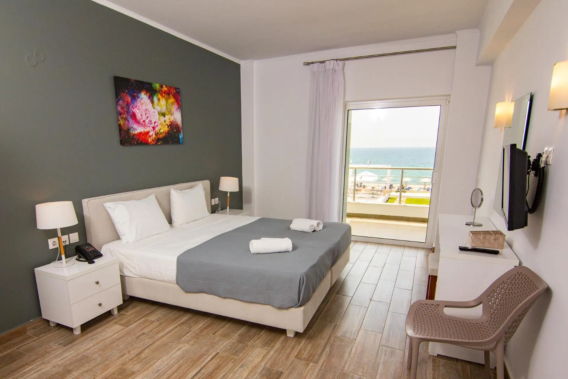 Photo of the whole room, Bed in Blue Sea Hotel