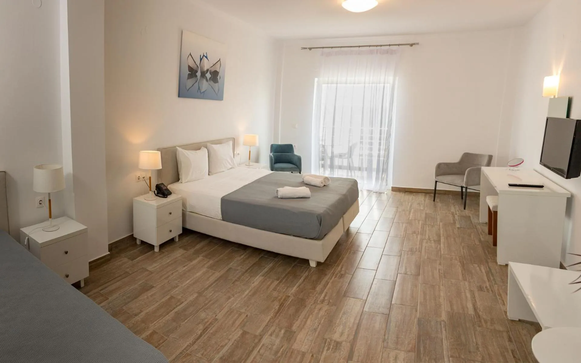 Photo of the whole room, Bed in Blue Sea Hotel