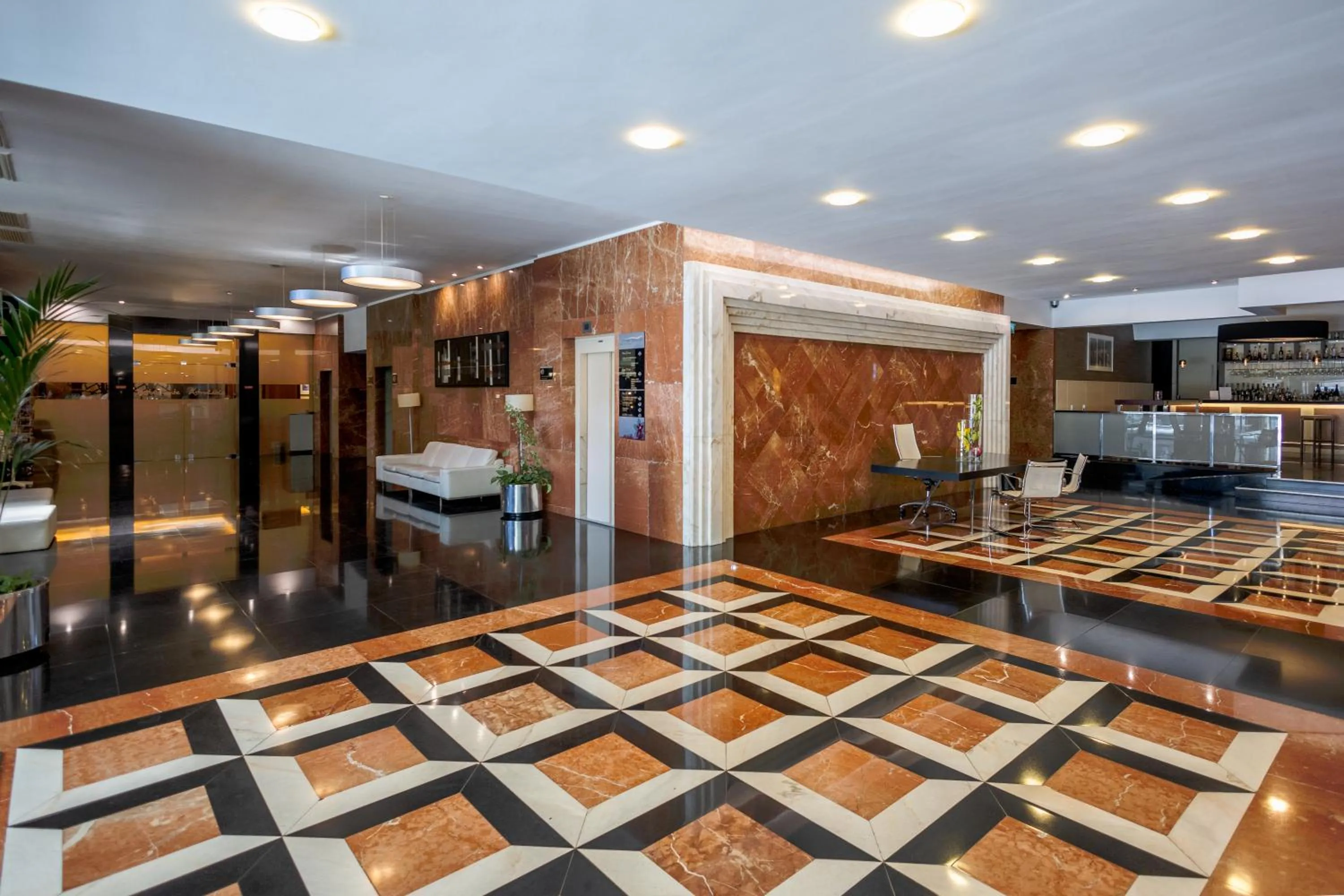Lobby or reception in SANA Metropolitan Hotel
