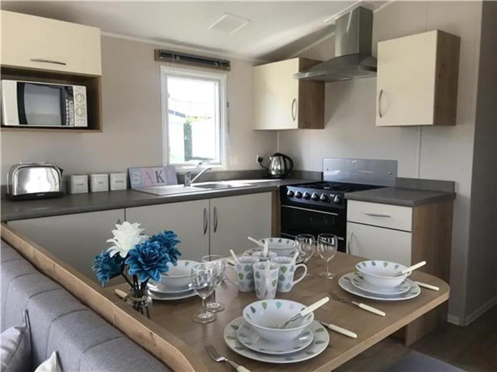 Kitchen or kitchenette in Par Sands Coastal Holiday park