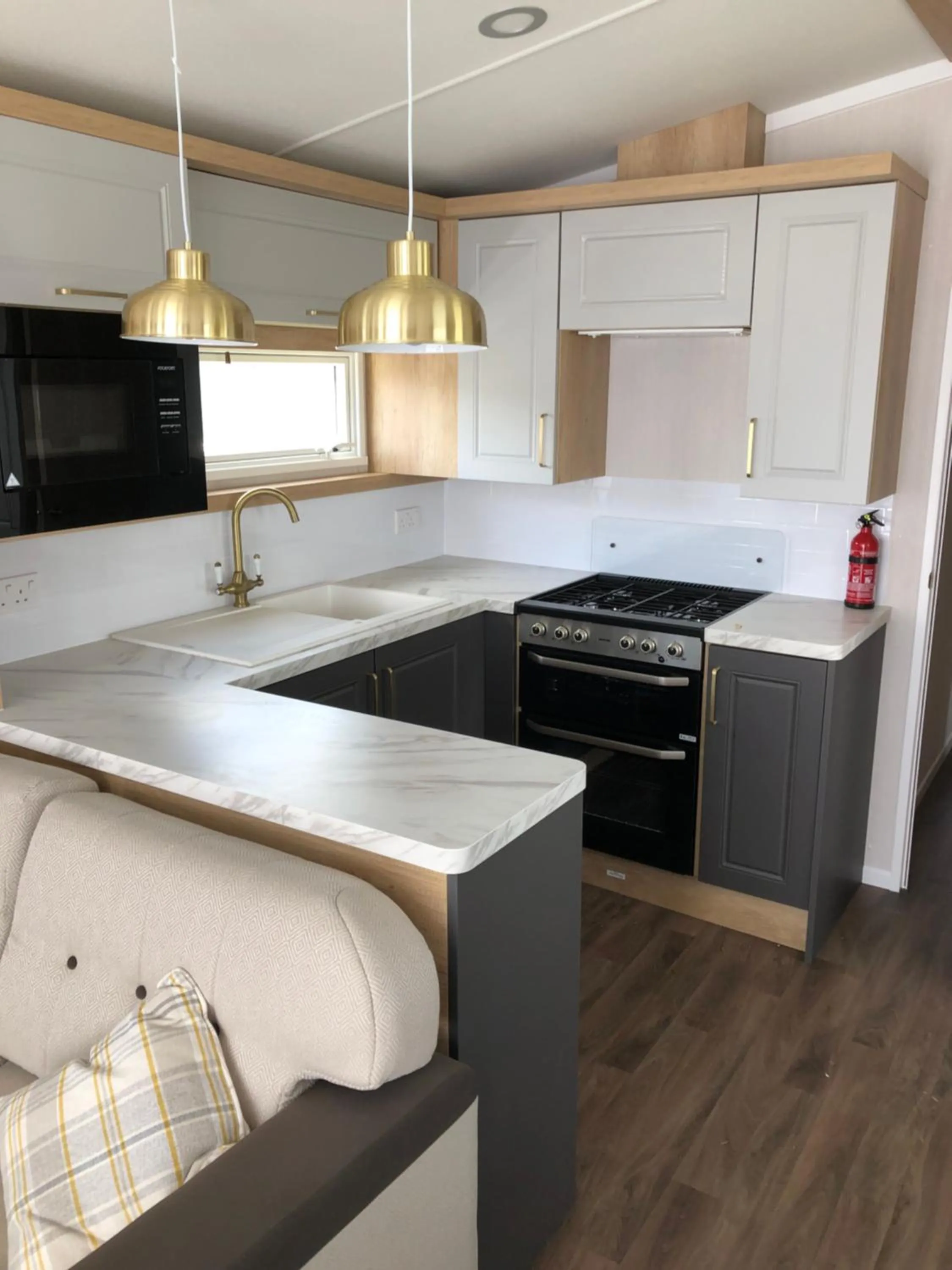 Kitchen or kitchenette in Par Sands Coastal Holiday park