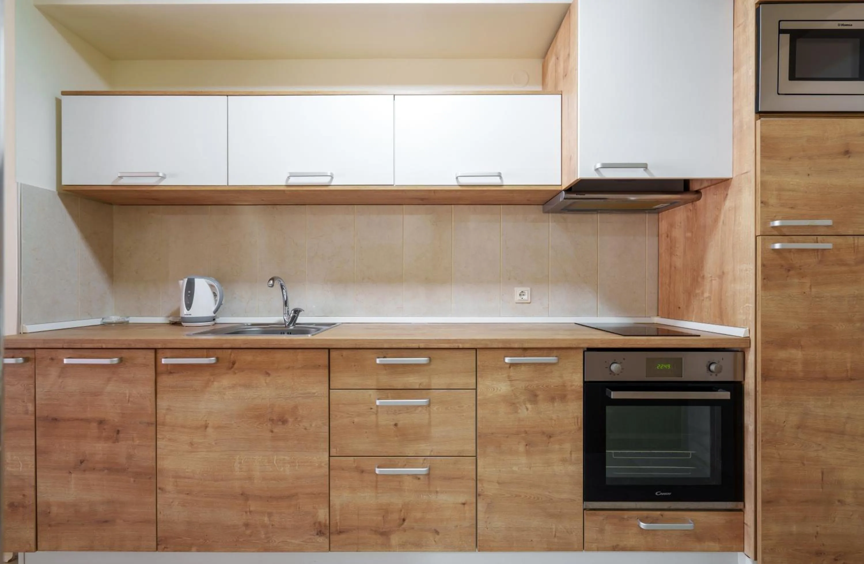 Kitchen or kitchenette in Hotel Harmonia by Dukley