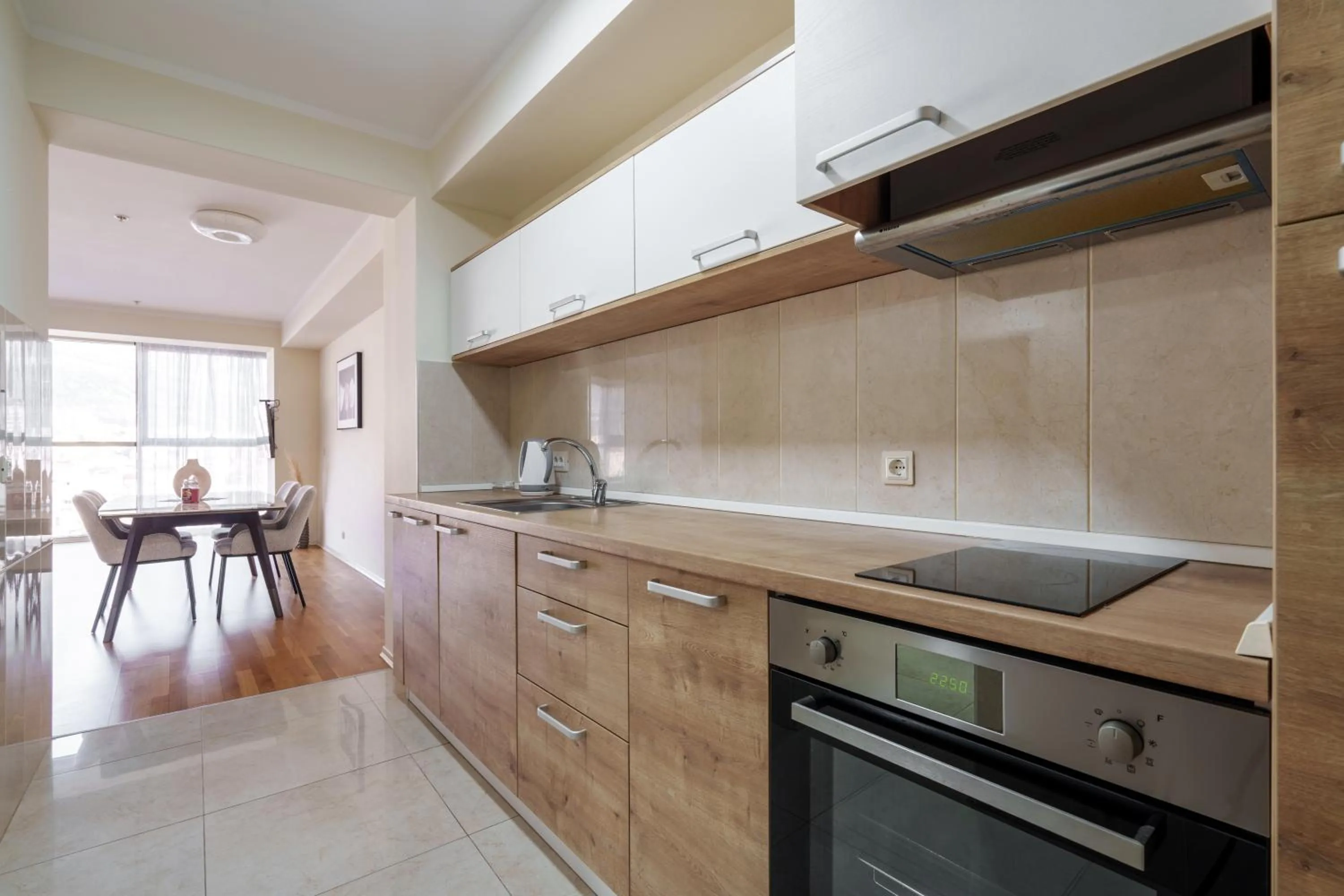 Kitchen or kitchenette in Hotel Harmonia by Dukley