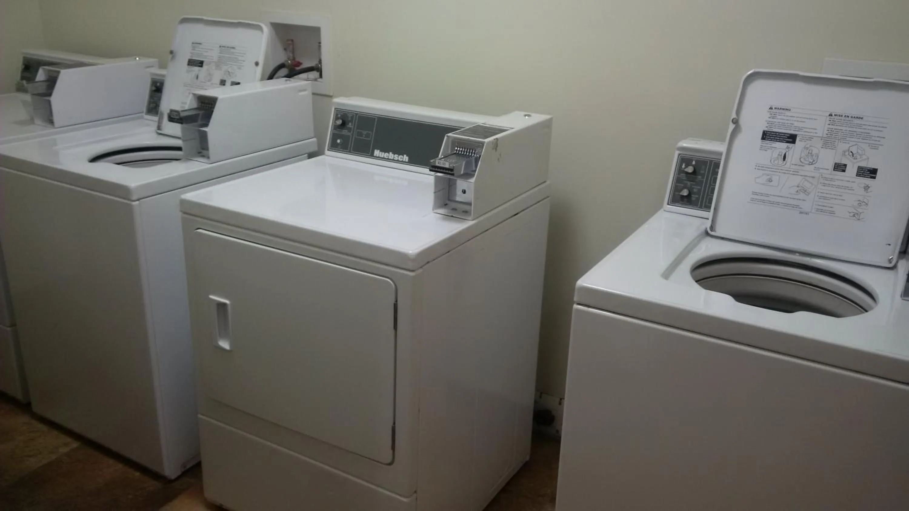 washing machine in Sigma Inn & Suites Hudson's Hope