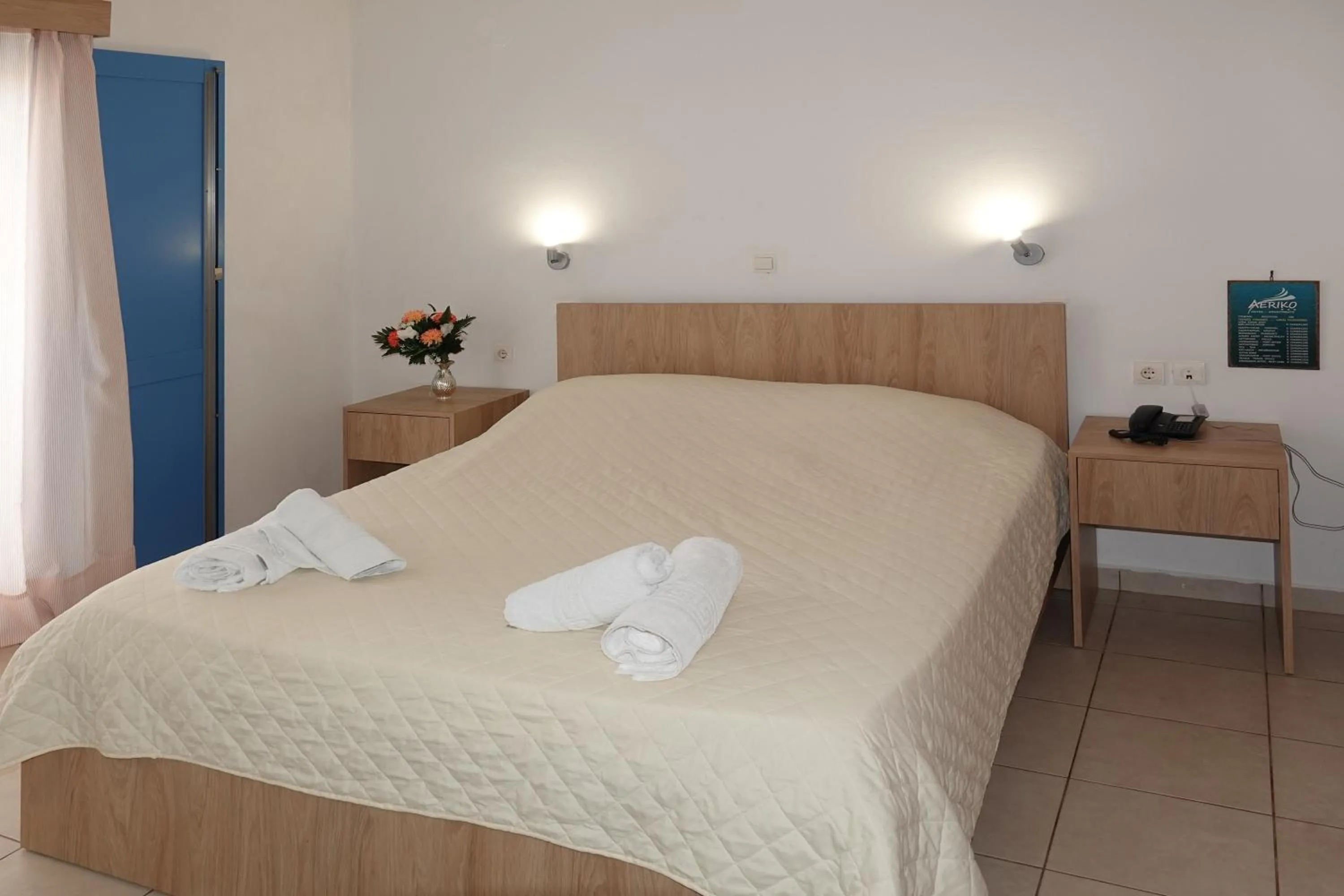 Bed in Aeriko Hotel Apartments