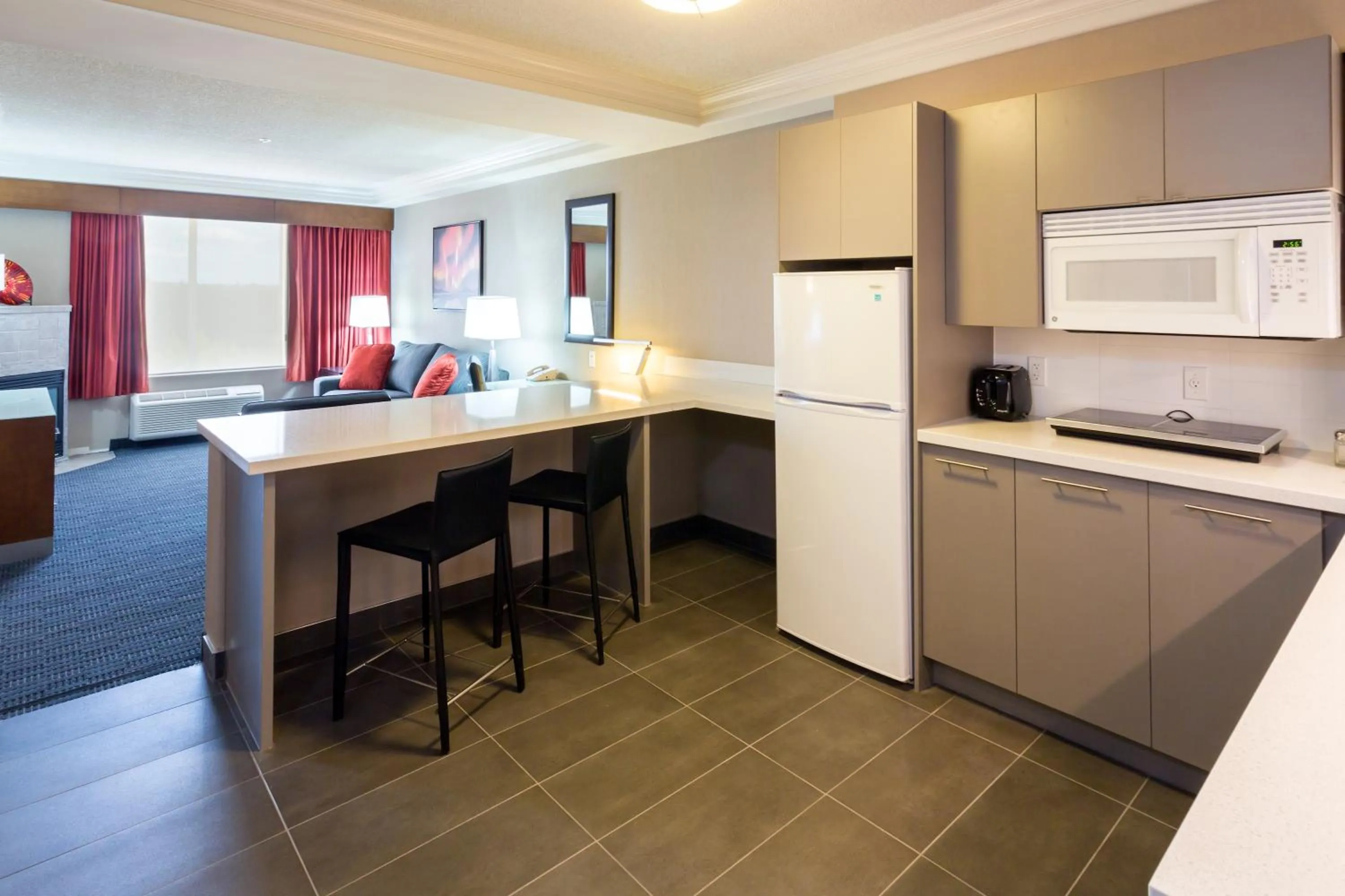 Kitchen or kitchenette in Radisson Hotel & Suites Fort McMurray