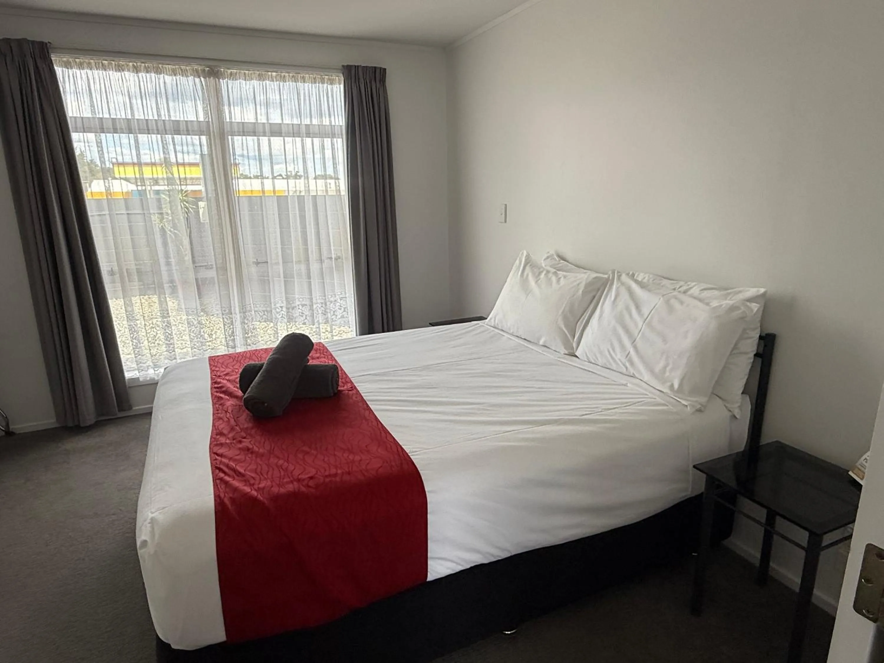 Bed in Ambassador Motor Inn