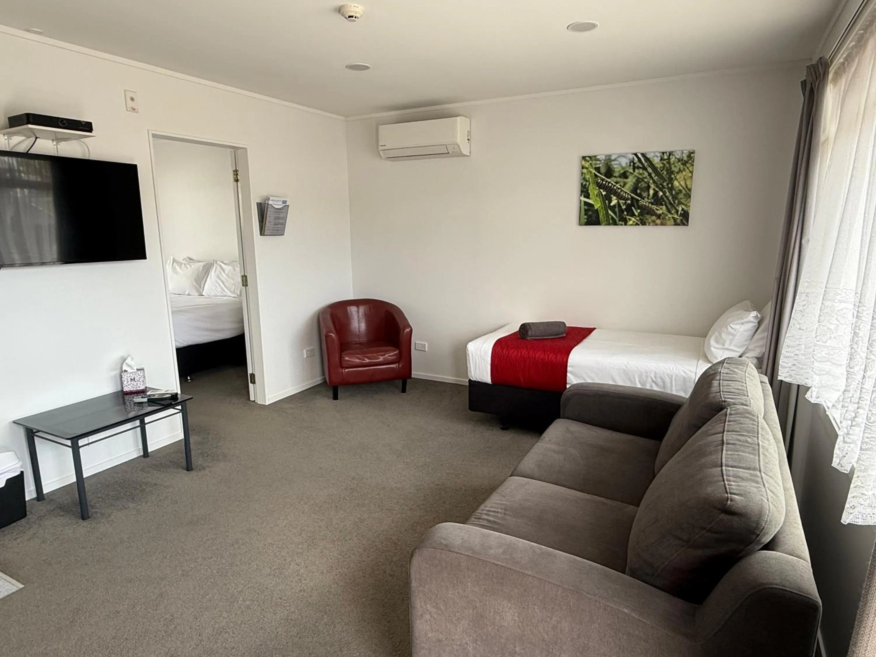 Bed in Ambassador Motor Inn