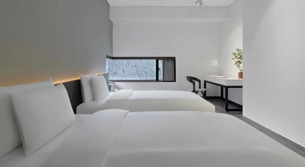 Bed in Commune by the Great Wall, in the Unbound Collection by Hyatt