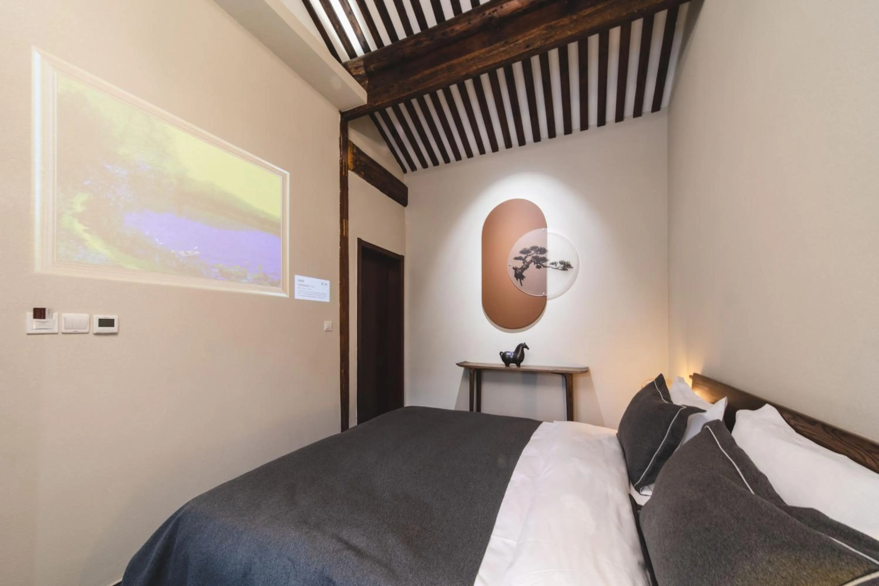 Bed in Guipu Beihai Courtyard Hotel Beijing