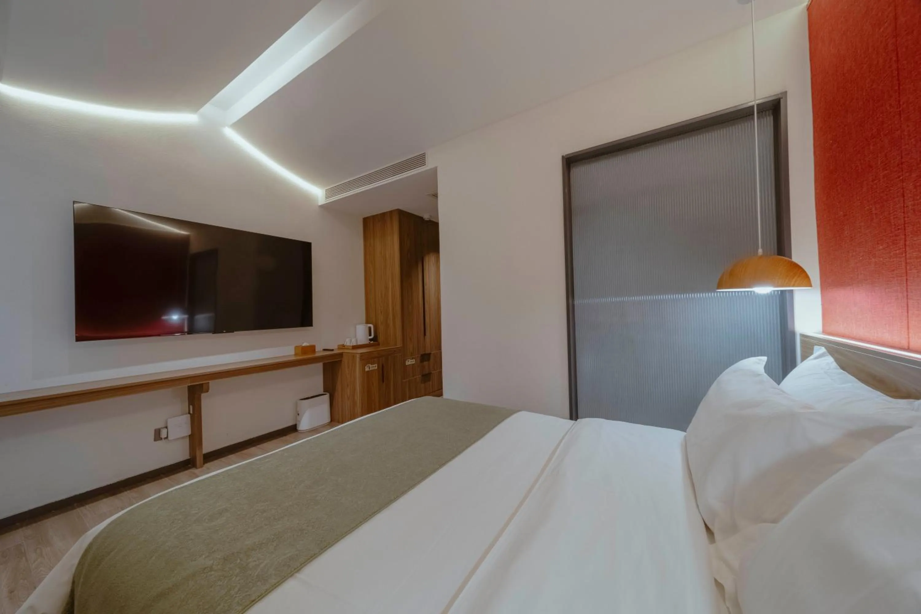 Bed in Guipu Beihai Courtyard Hotel Beijing