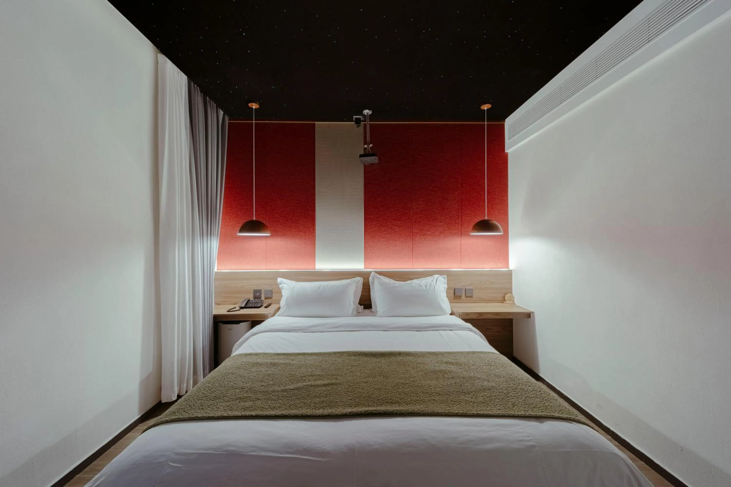 Bed in Guipu Beihai Courtyard Hotel Beijing