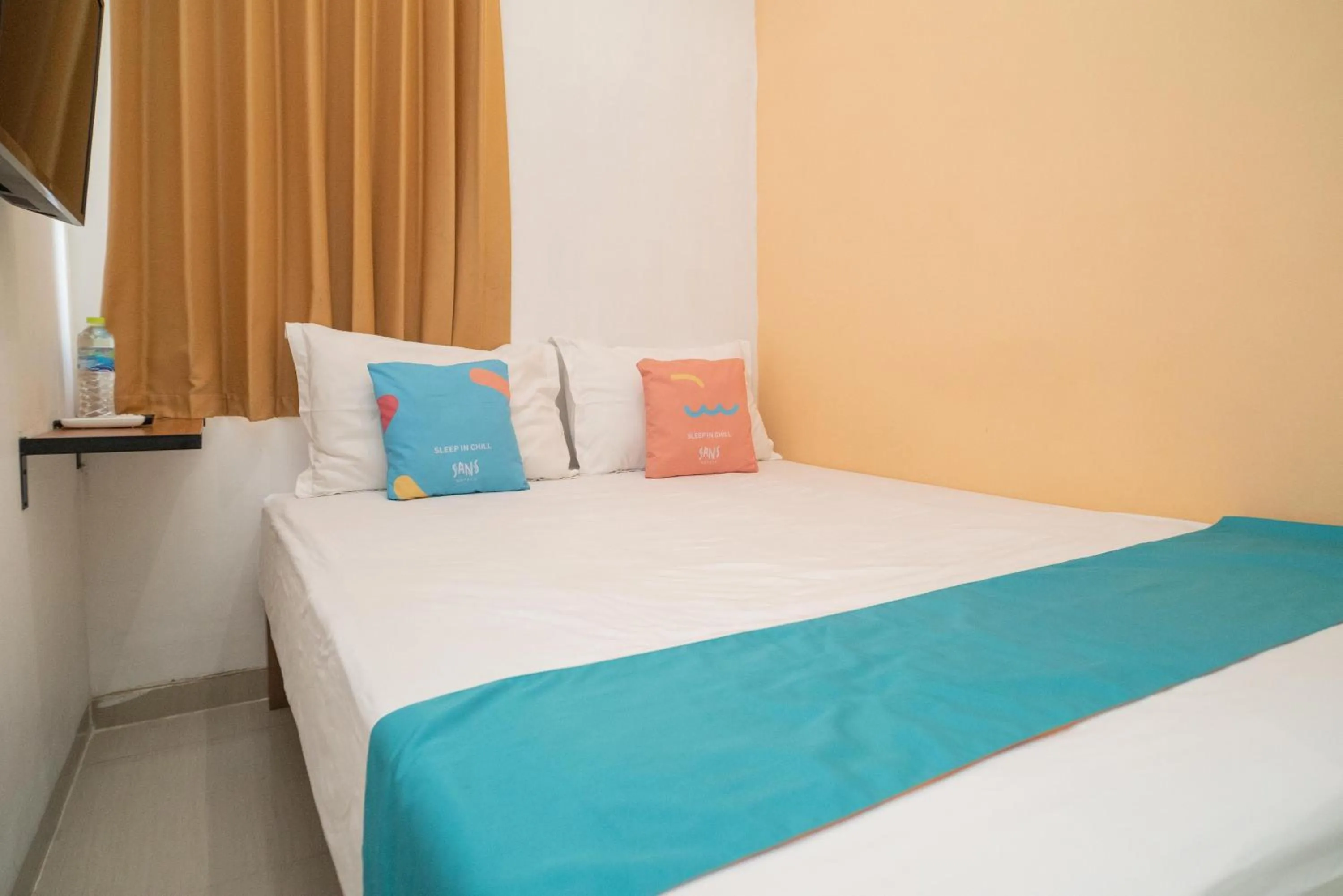 Bedroom, Bed in Sans Hotel Kupang Indah Surabaya