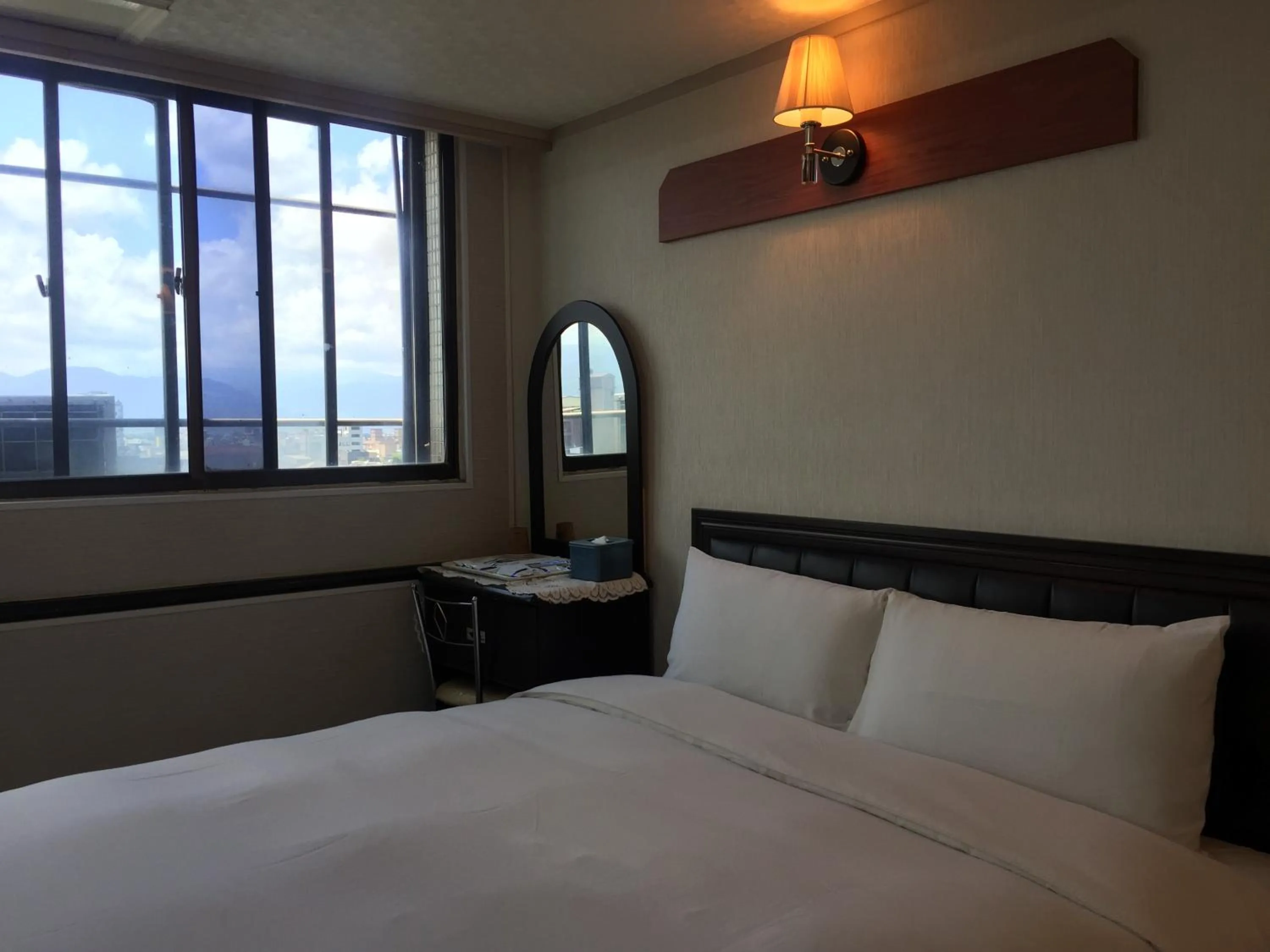 Bed in King Lo Tung Hotel