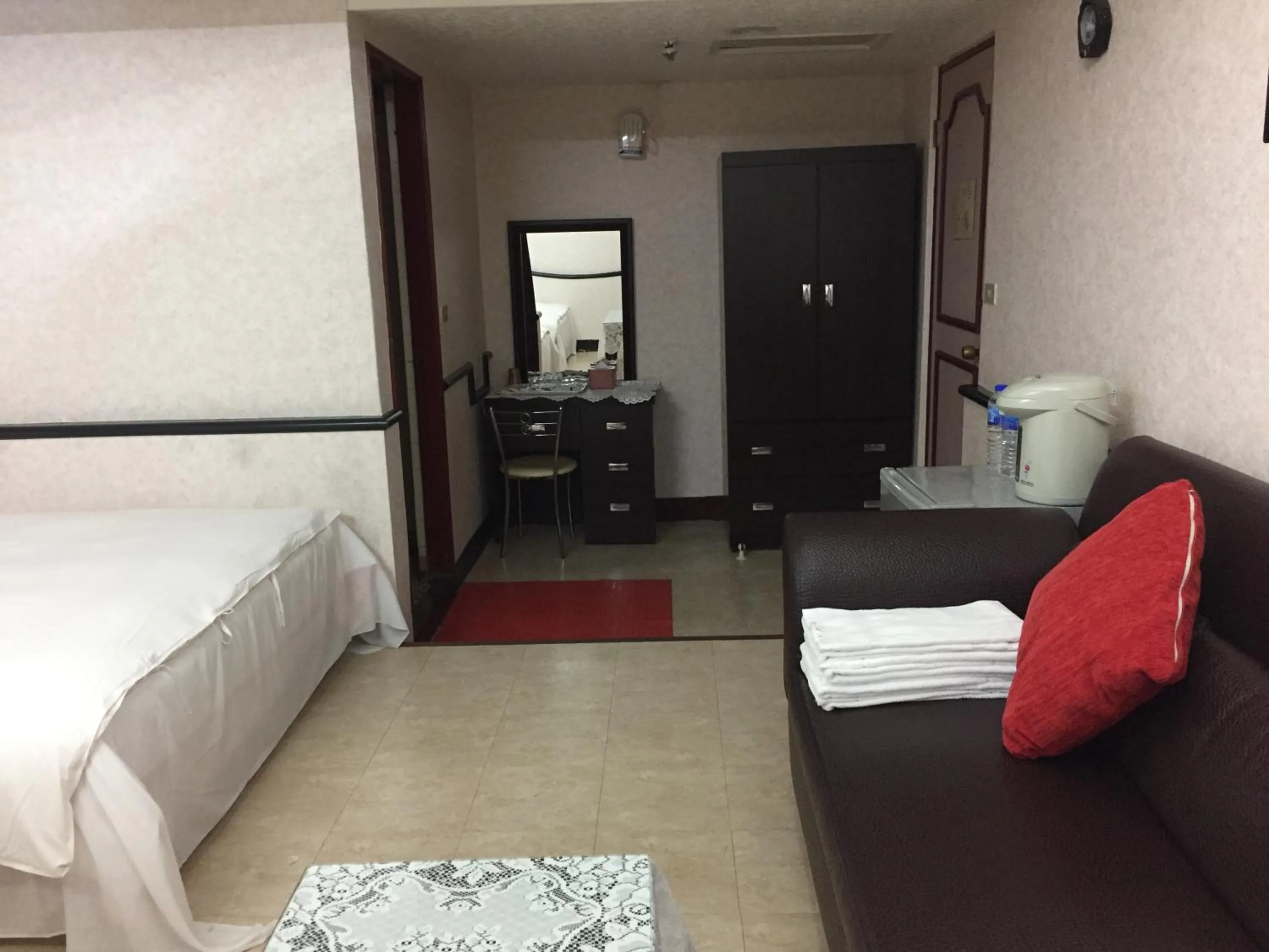 Bed in King Lo Tung Hotel