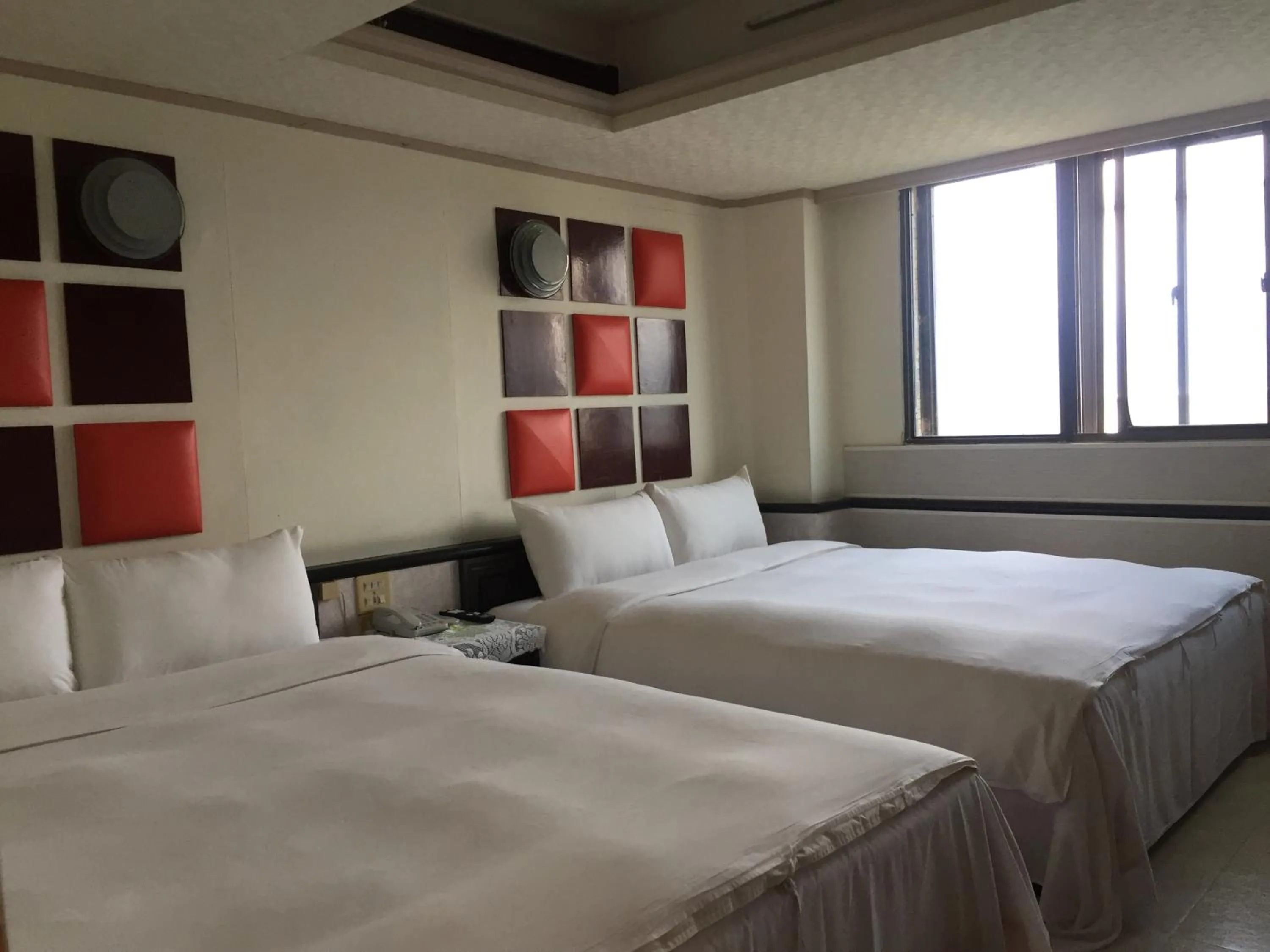 Bed in King Lo Tung Hotel