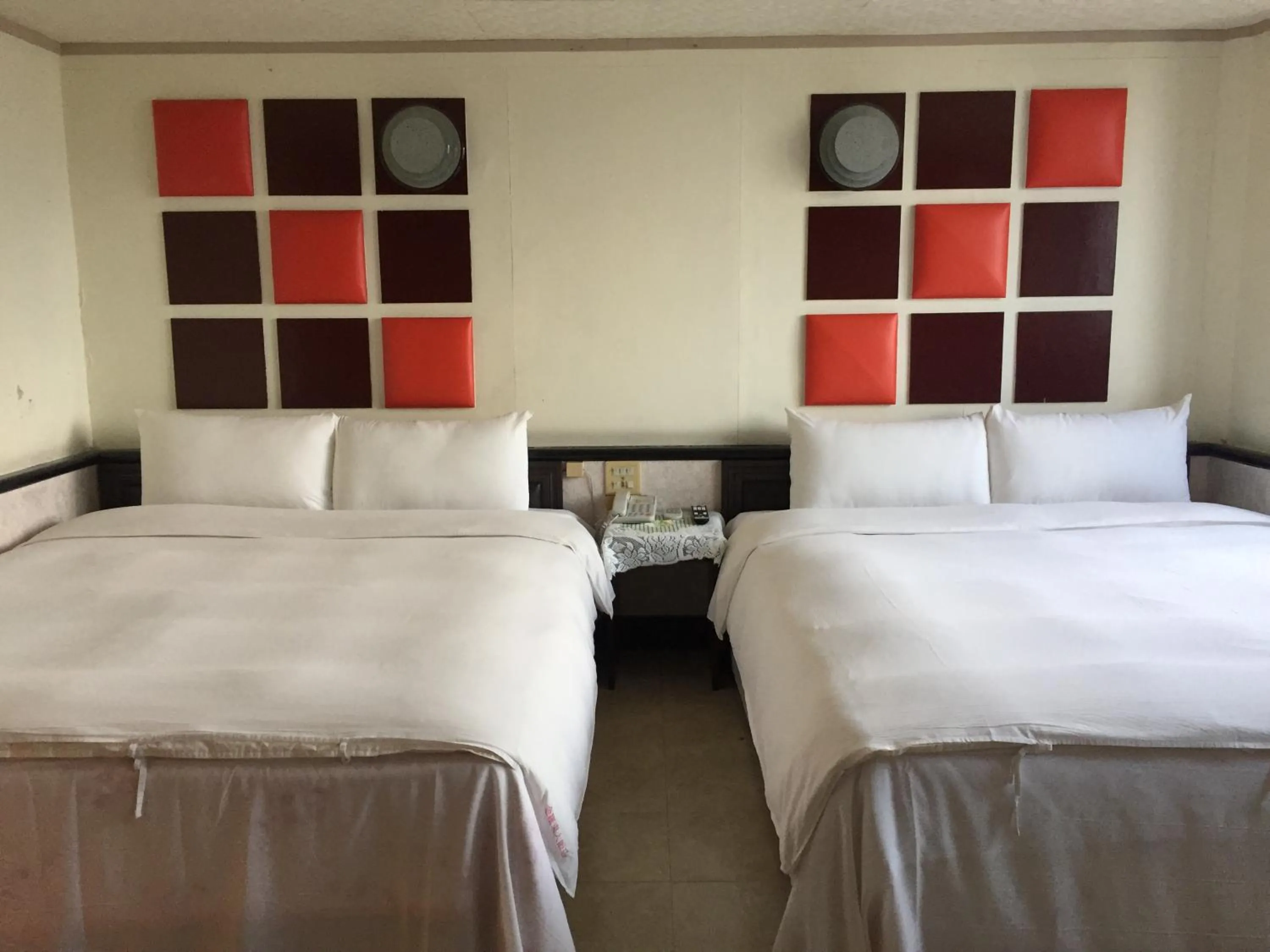Bed in King Lo Tung Hotel
