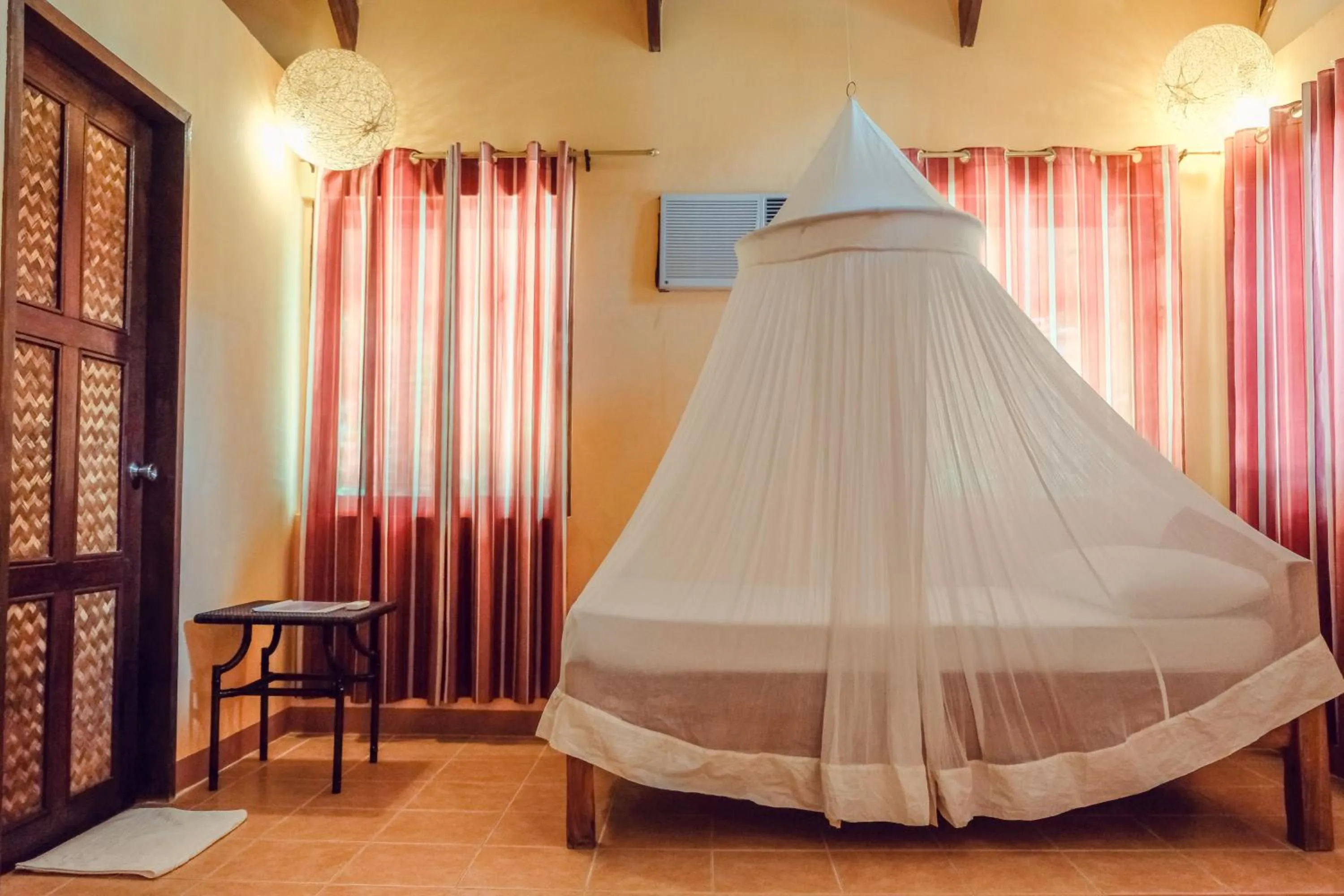 Bed in Flower Island Resort