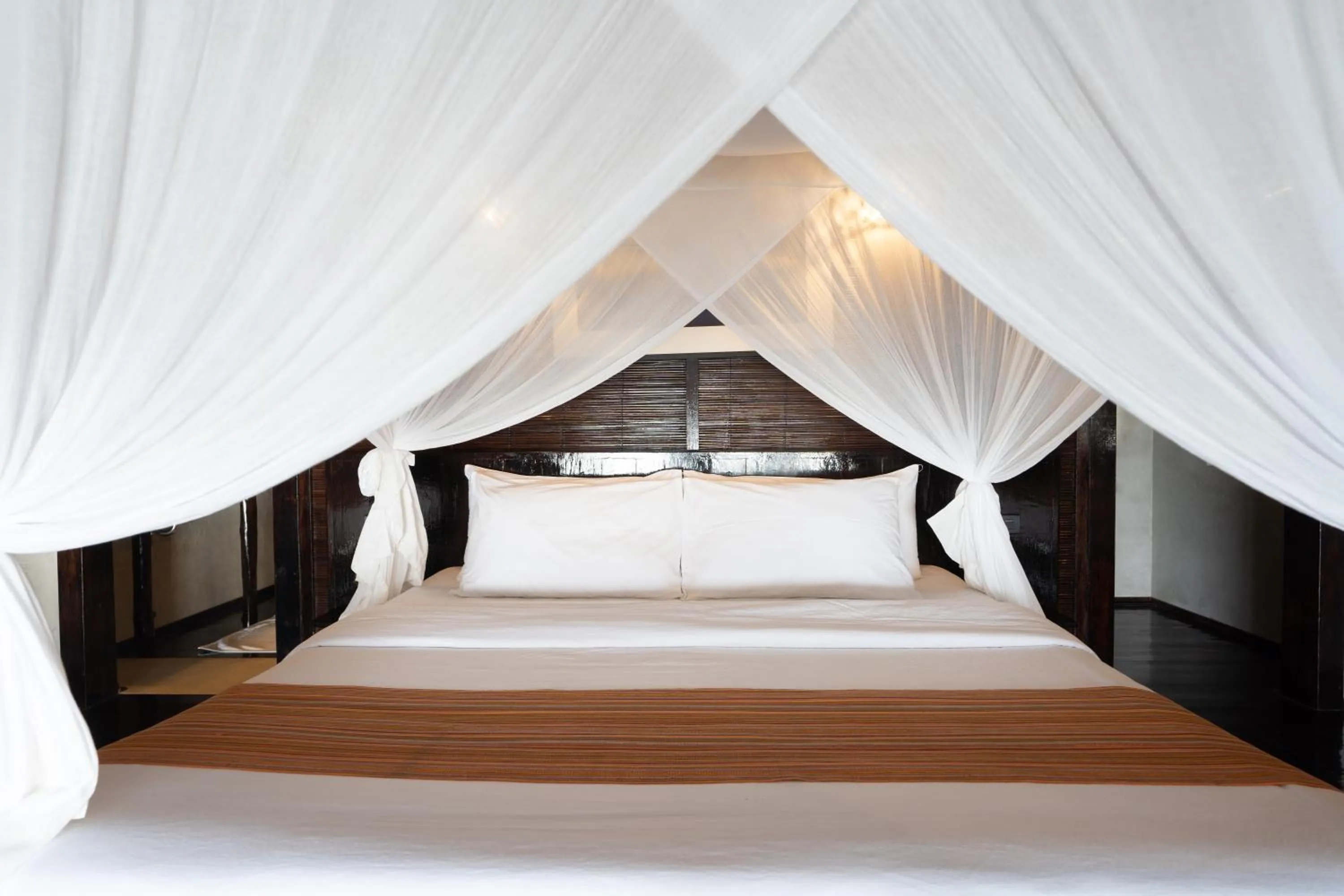 Bed in Flower Island Resort