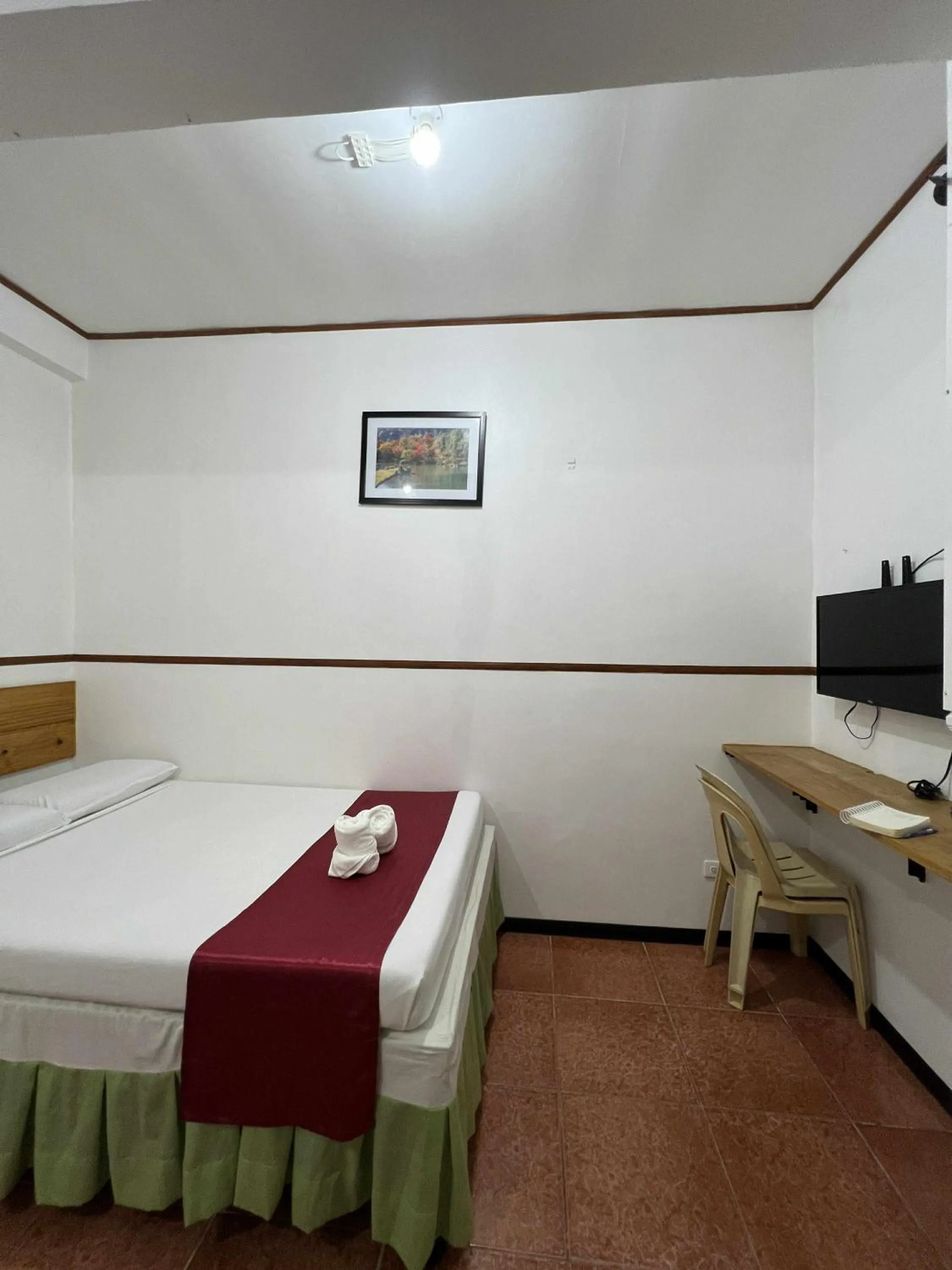 Bed in Axis Pension Hotel