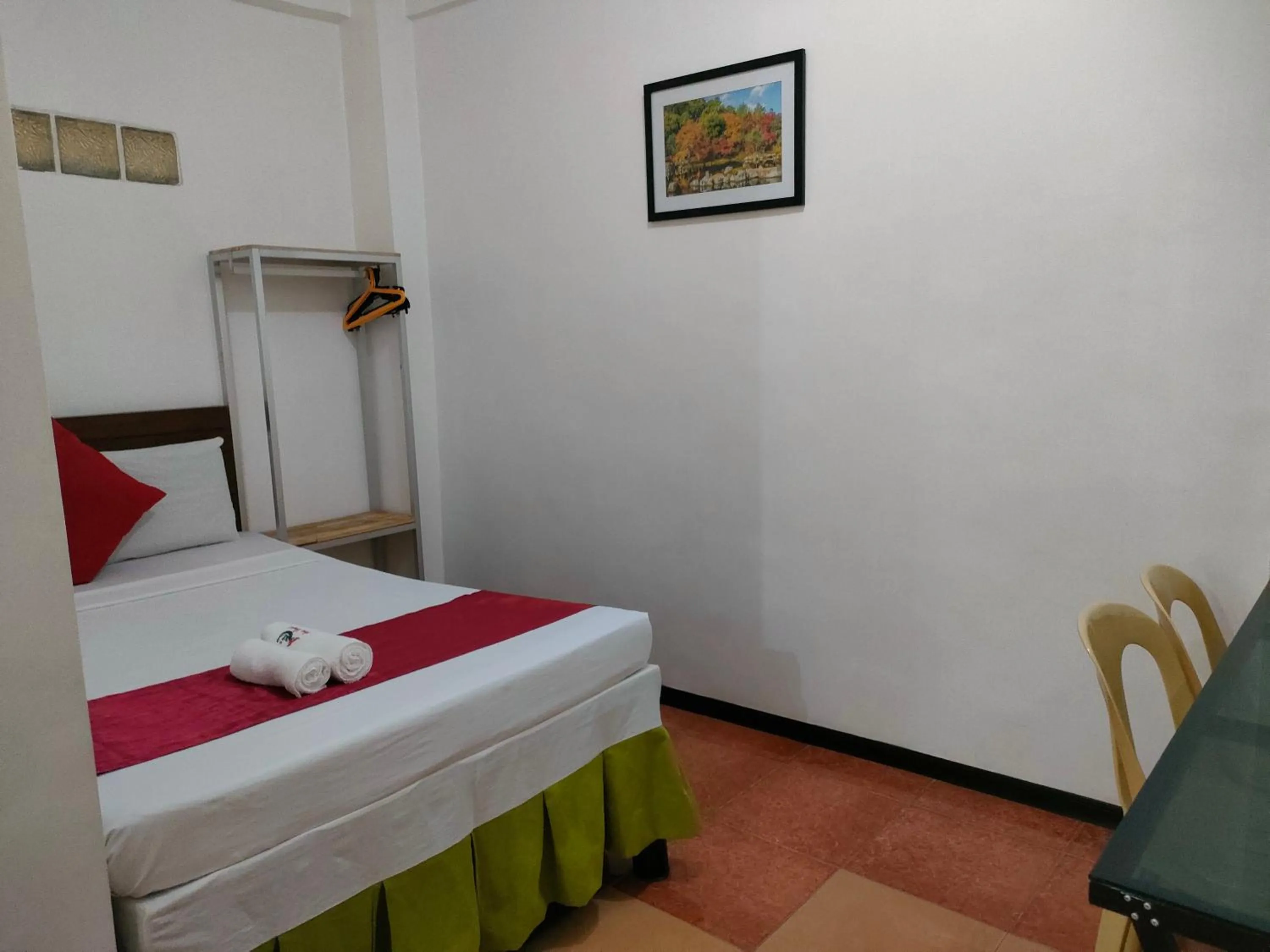 Bed in Axis Pension Hotel