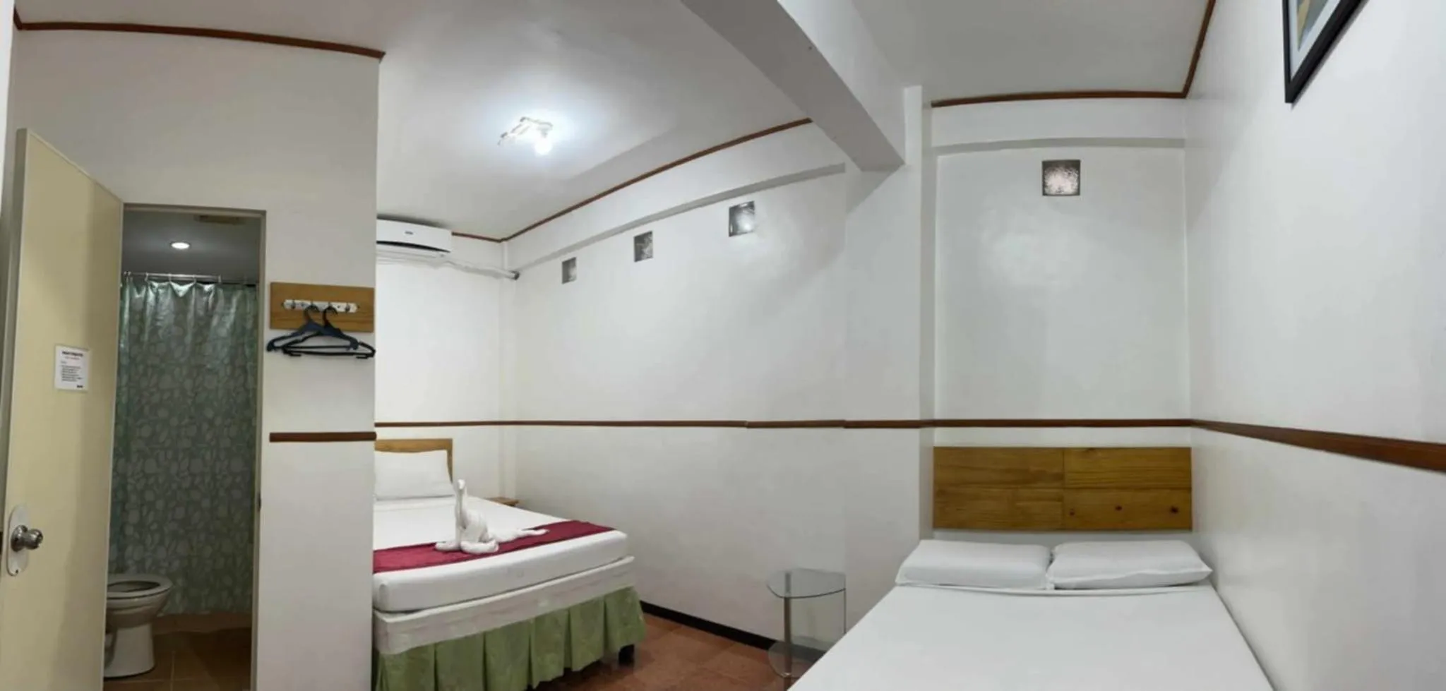 Bed in Axis Pension Hotel