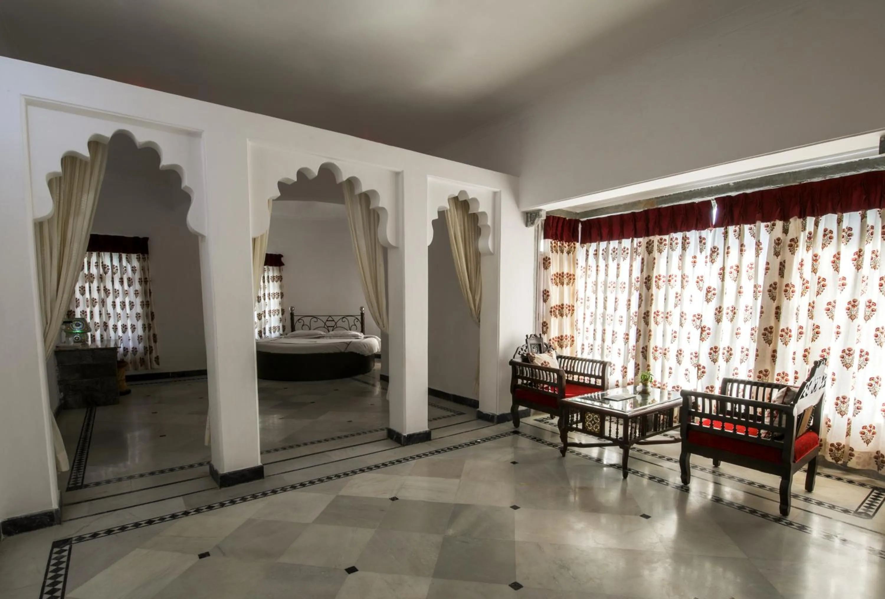 Seating area, Bed in Shahpura Kumbhal Villas