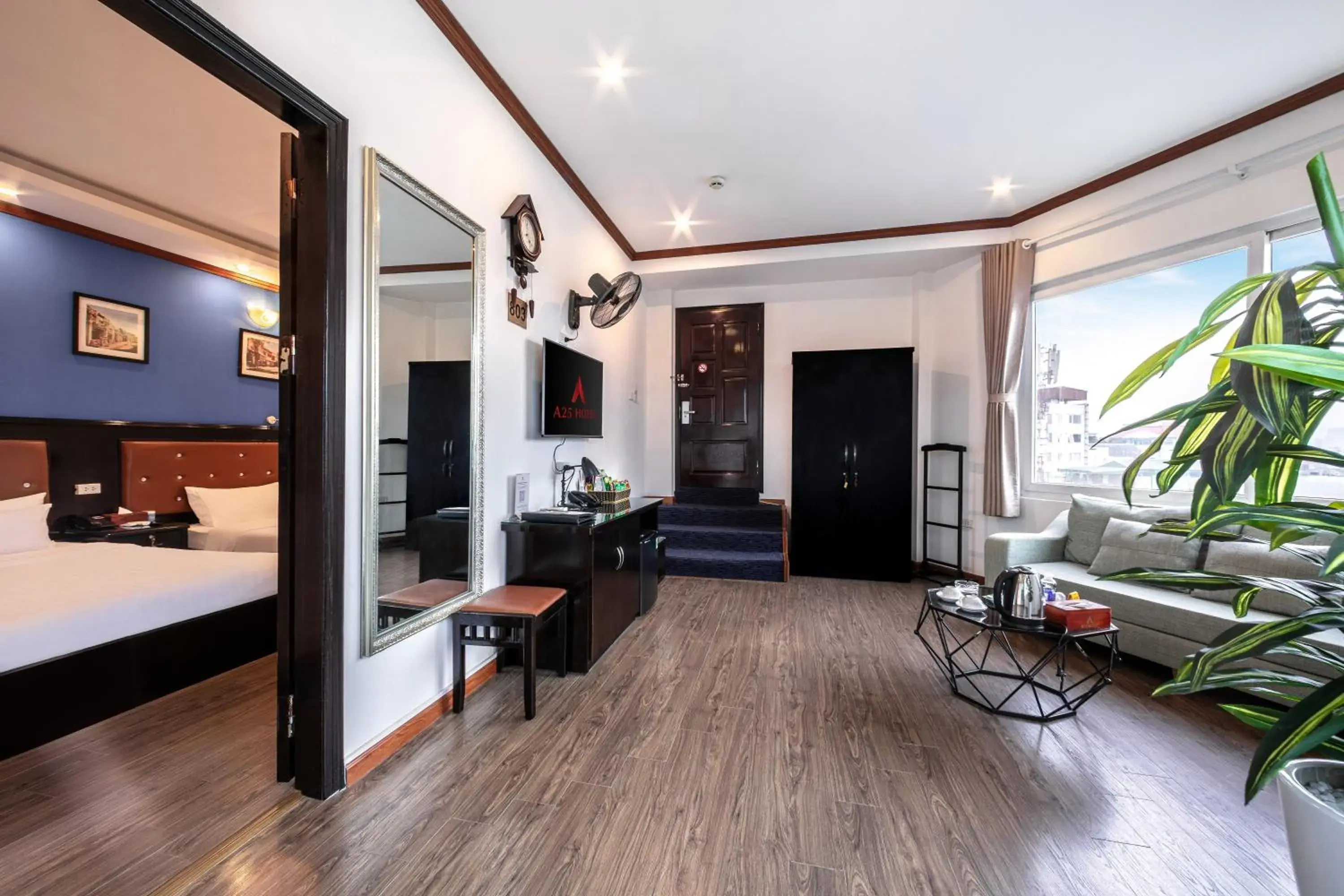 Living room, Bed in A25 Hotel - 96 Hai Bà Trưng Living room, Bed in A25 Hotel - 96 Hai Bà Trưng