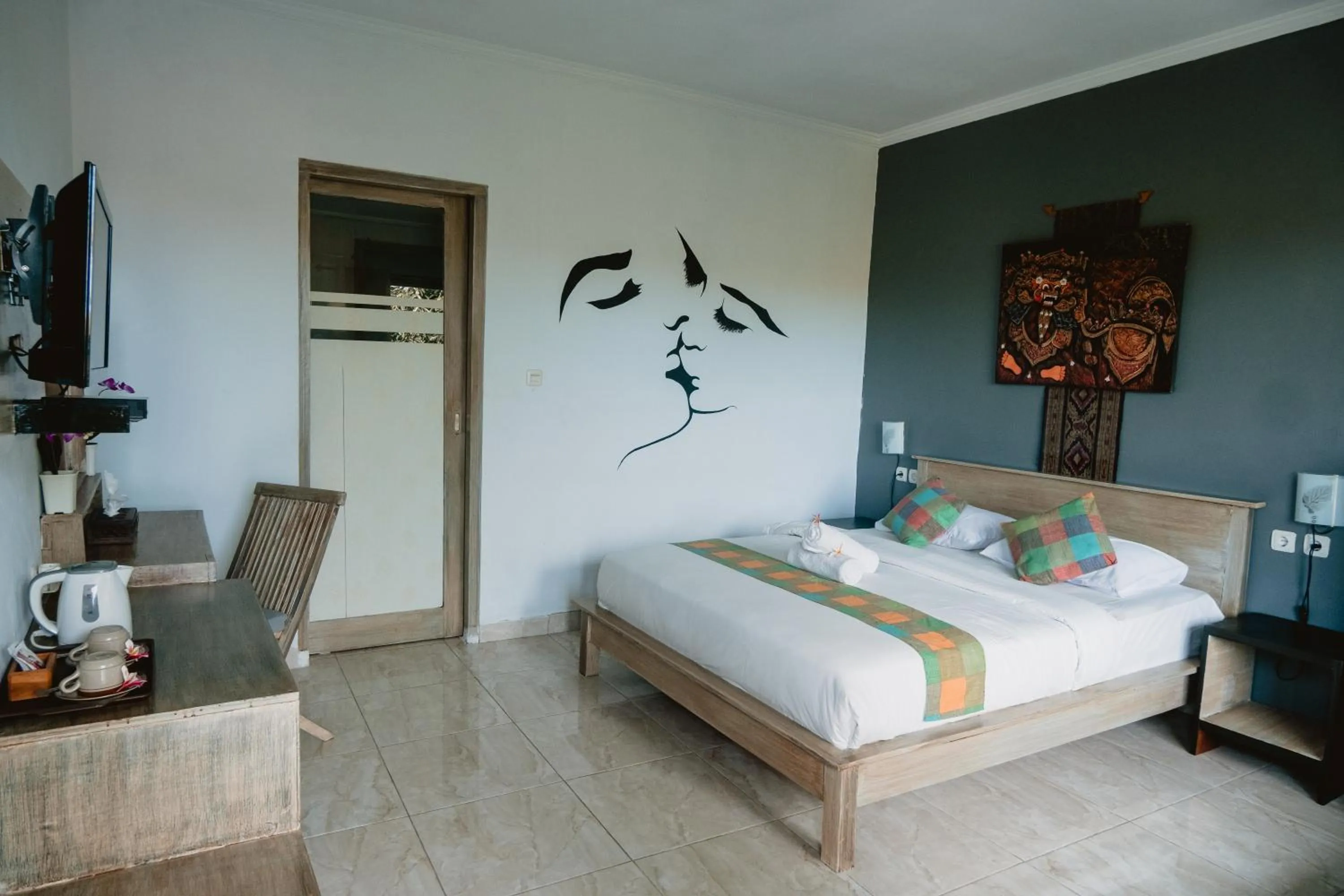 Bed in Kuri Garden Cottage