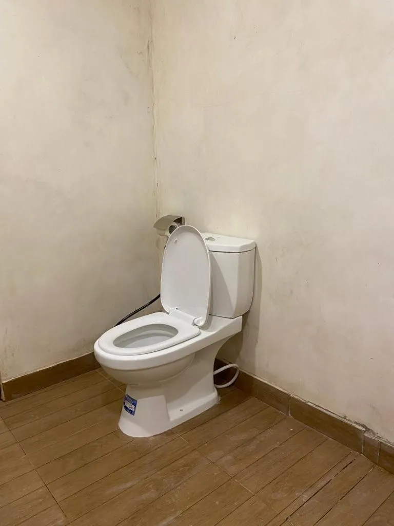 Toilet in Kuri Garden Cottage