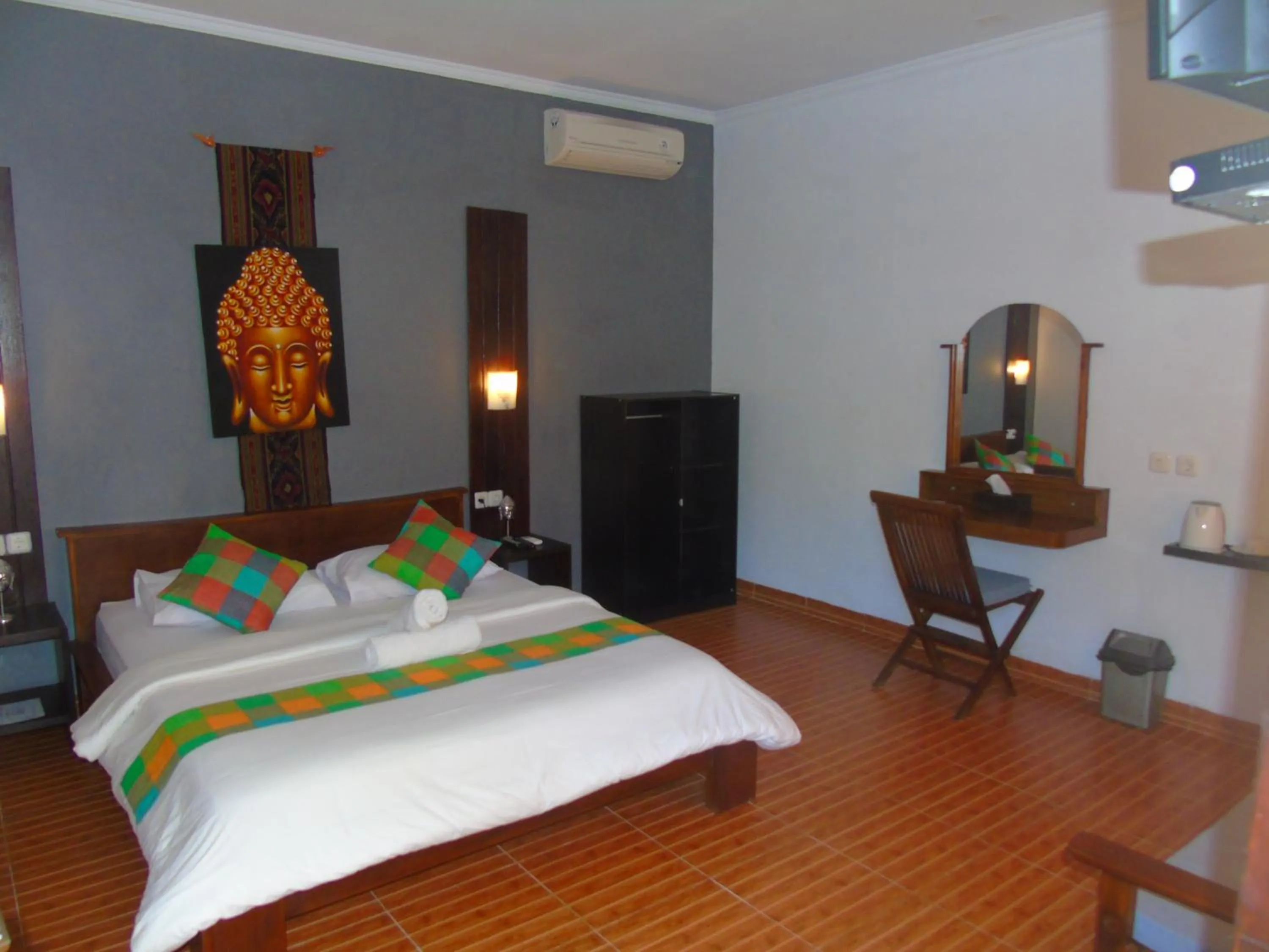 Bed in Kuri Garden Cottage