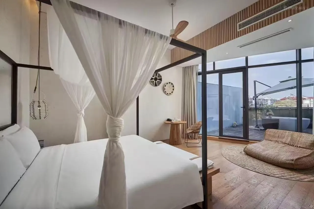 Bed in Manli Hotel Shanghai Pudong Airport Branch -Provide free shuttle buses to Pudong Airport and Disneyland