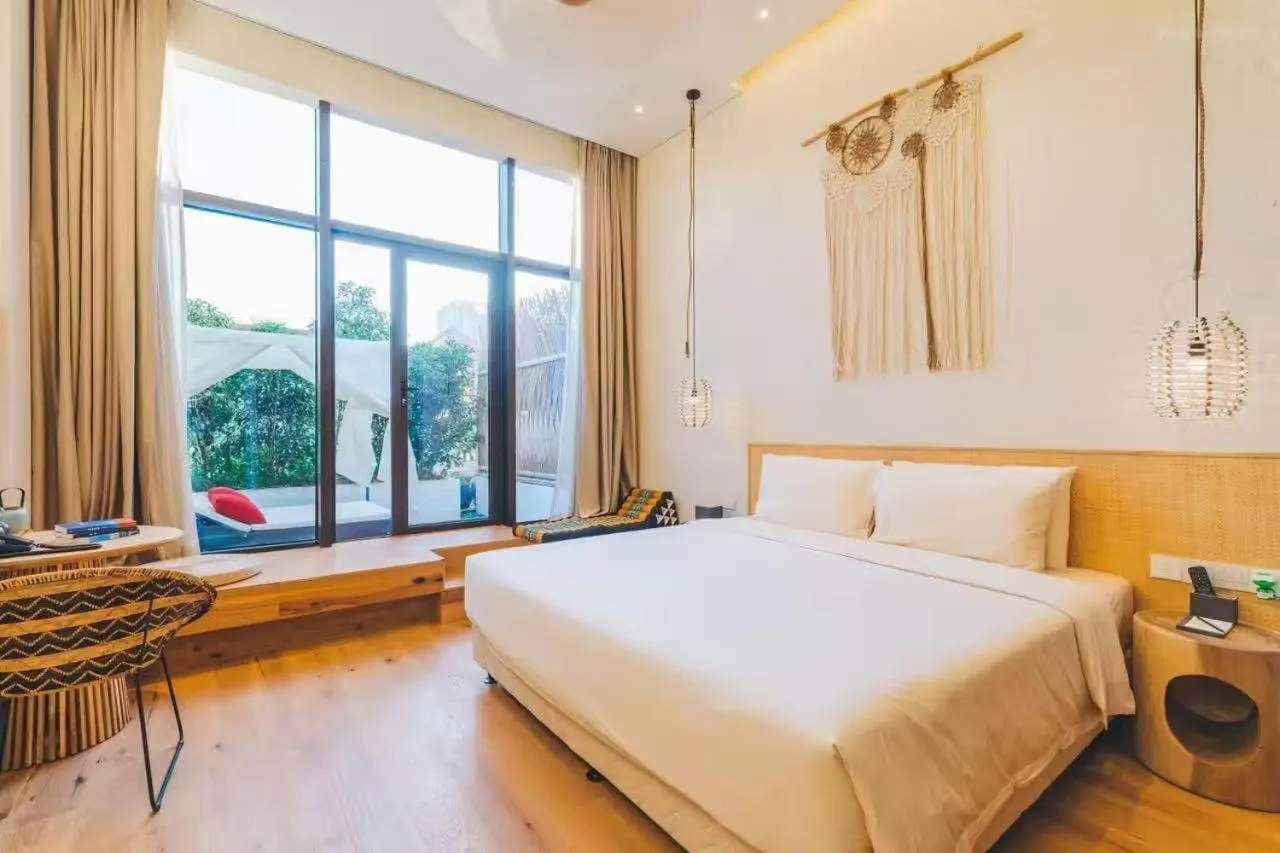 Bed in Manli Hotel Shanghai Pudong Airport Branch -Provide free shuttle buses to Pudong Airport and Disneyland