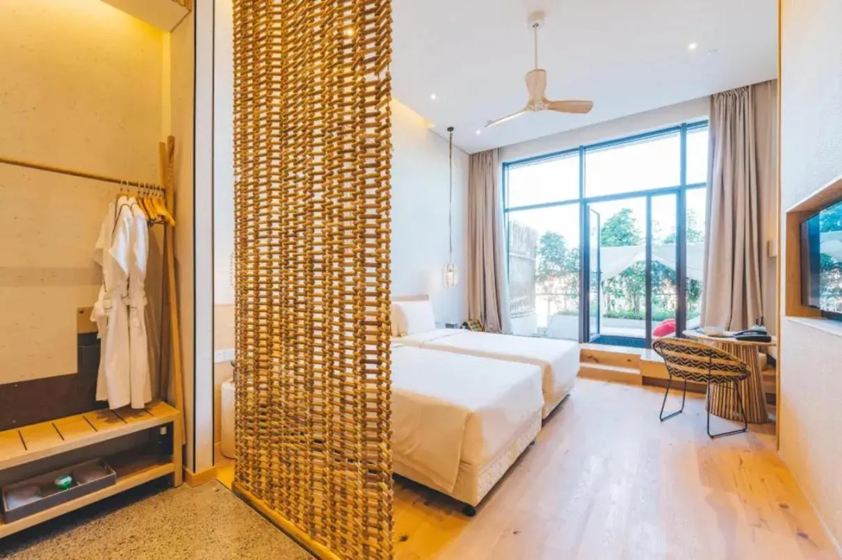 Bed in Manli Hotel Shanghai Pudong Airport Branch -Provide free shuttle buses to Pudong Airport and Disneyland