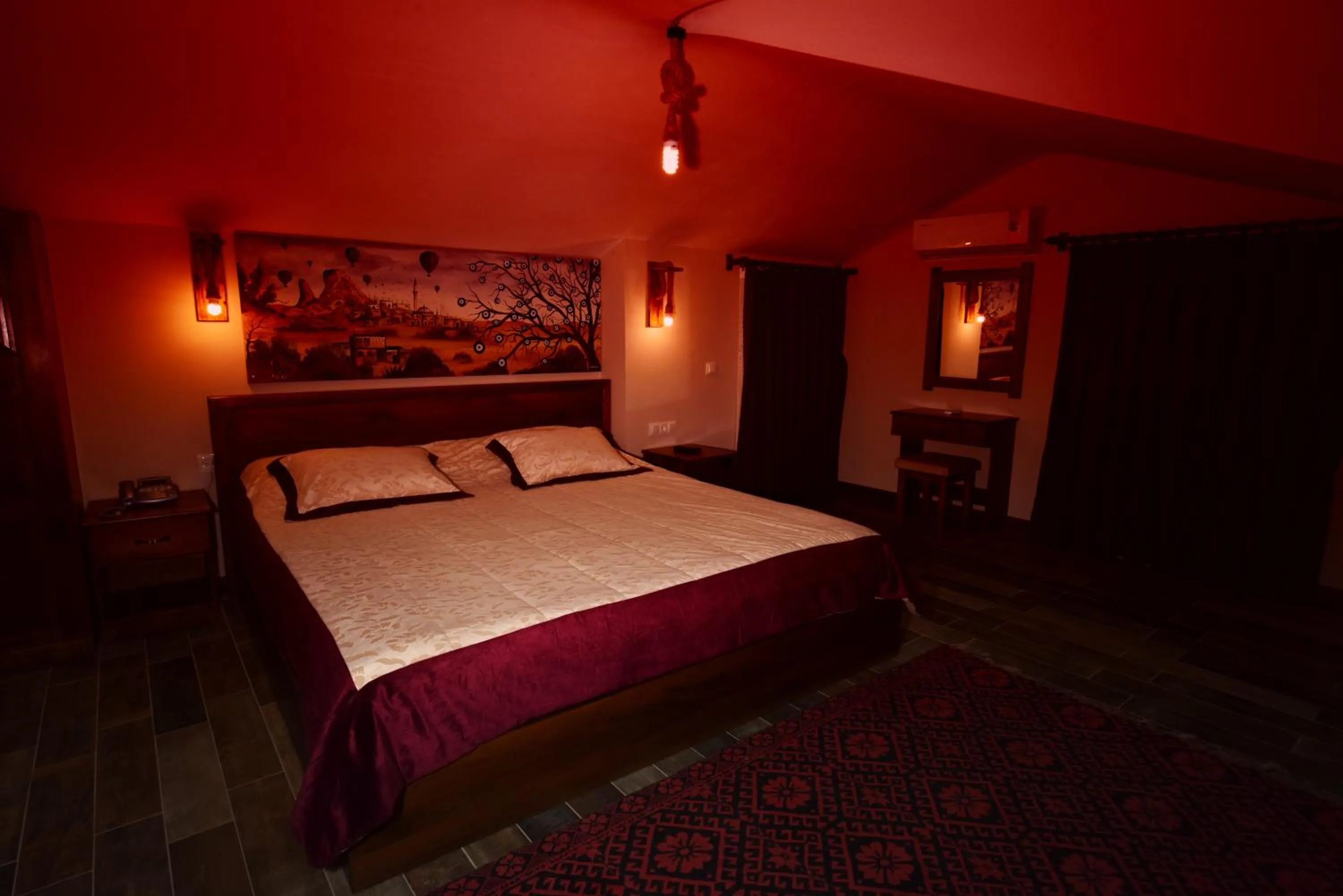 Bed in EL NAZAR STONE SUİTE