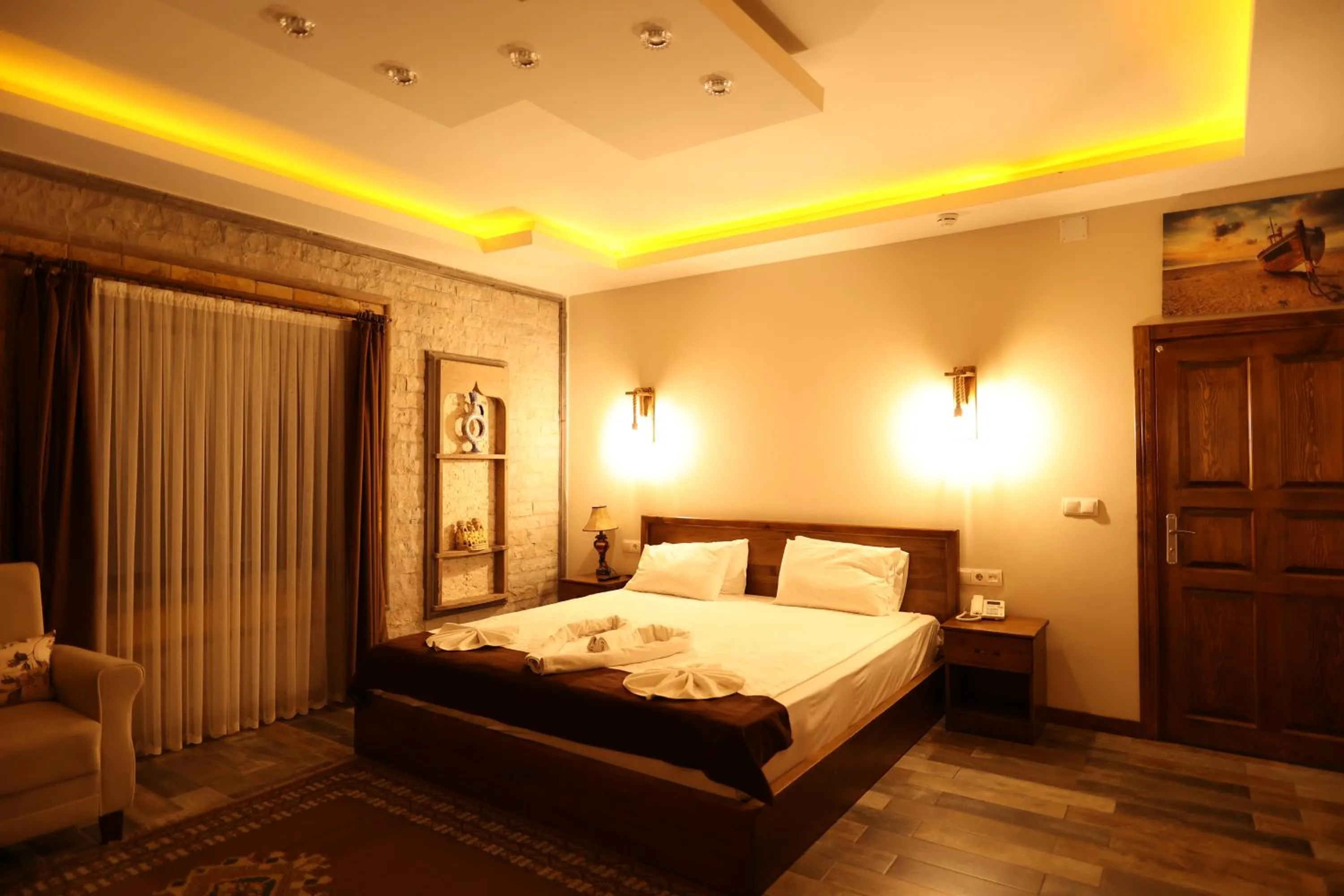 Bed in EL NAZAR STONE SUİTE