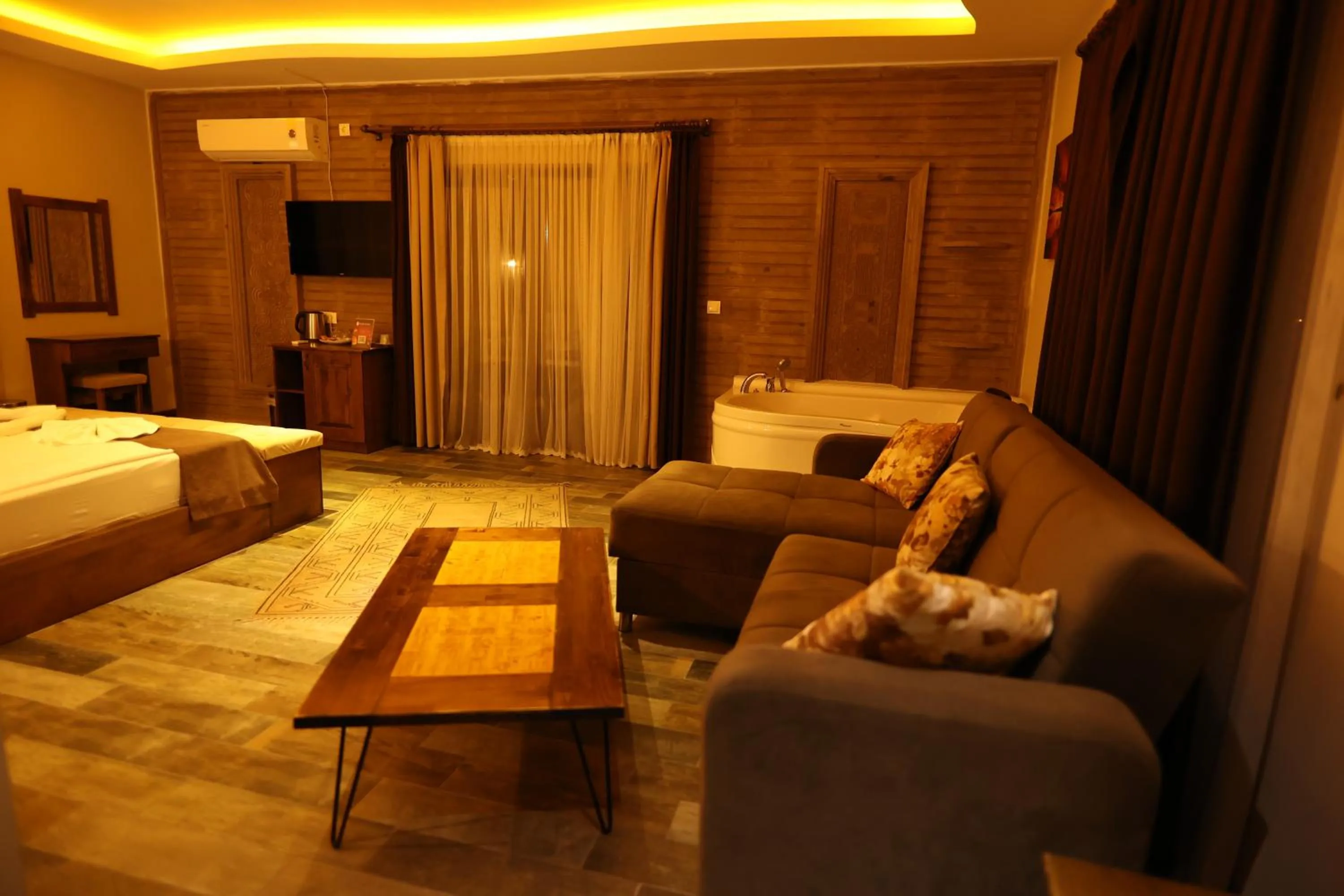 Bed in EL NAZAR STONE SUİTE