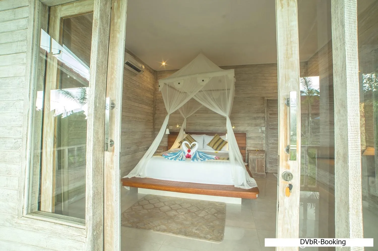 Bed in Dayung Villas By Reccoma