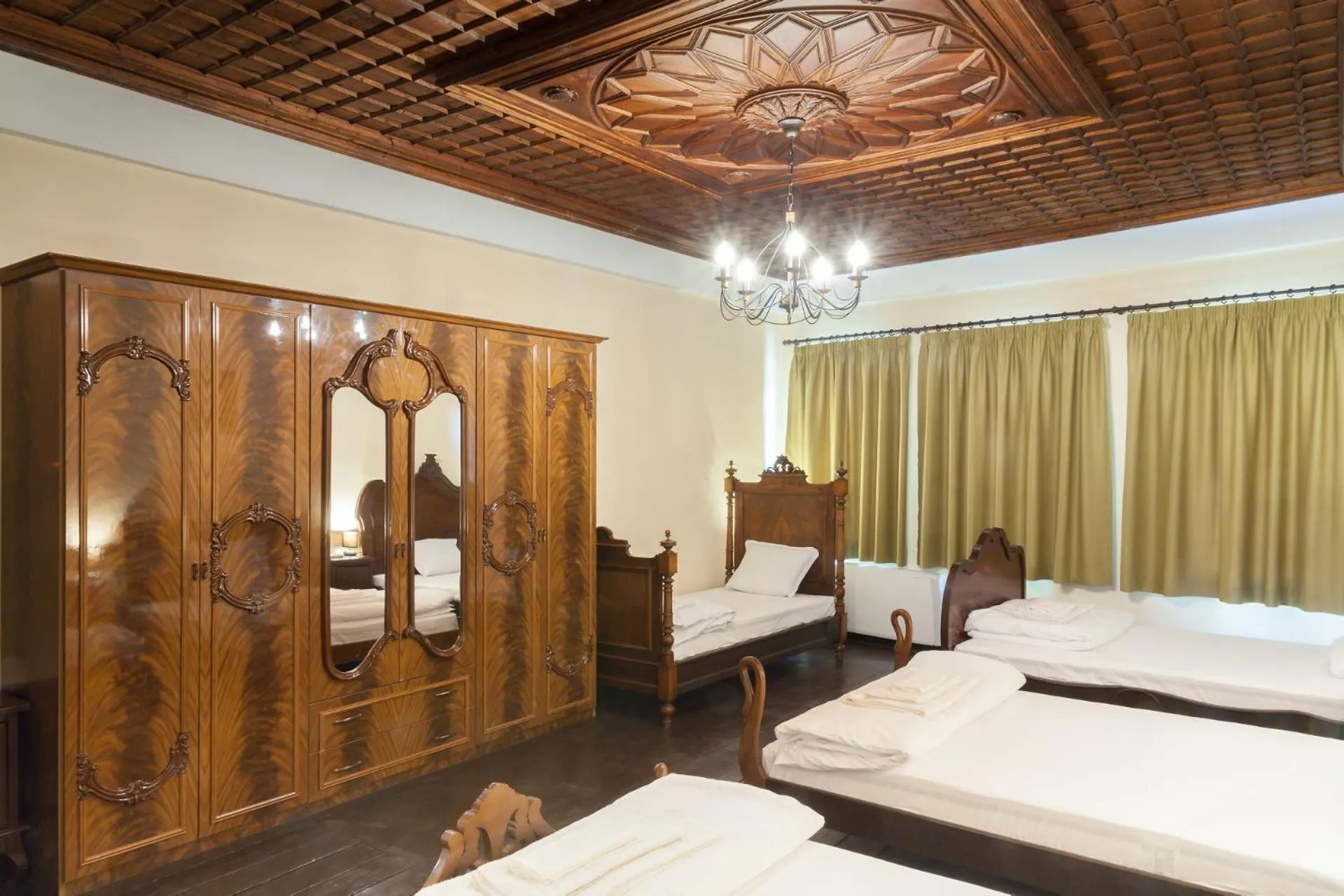 Bed in HiStory INN Unique Guest House