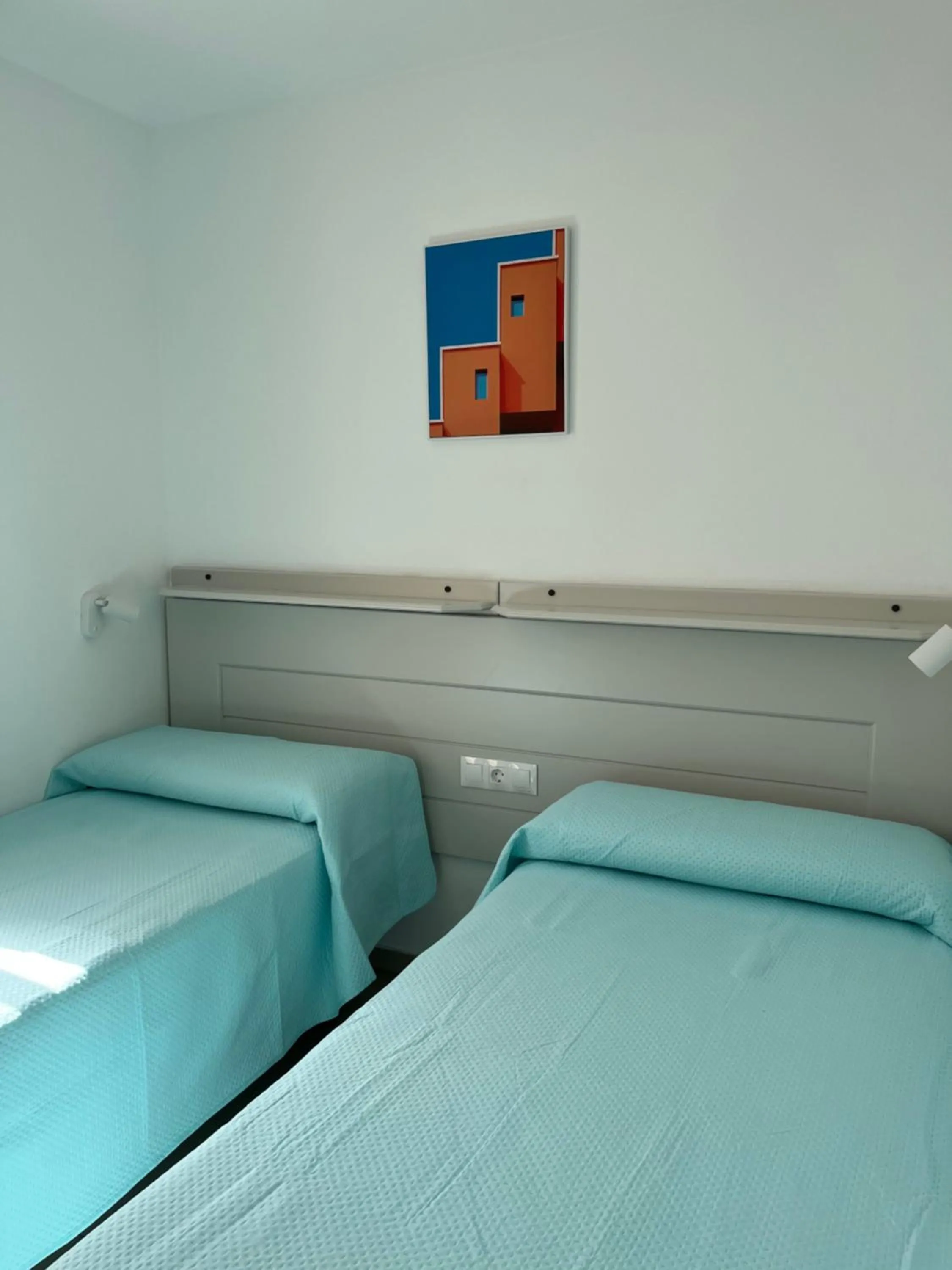 Bed in Apartamentos La Proa