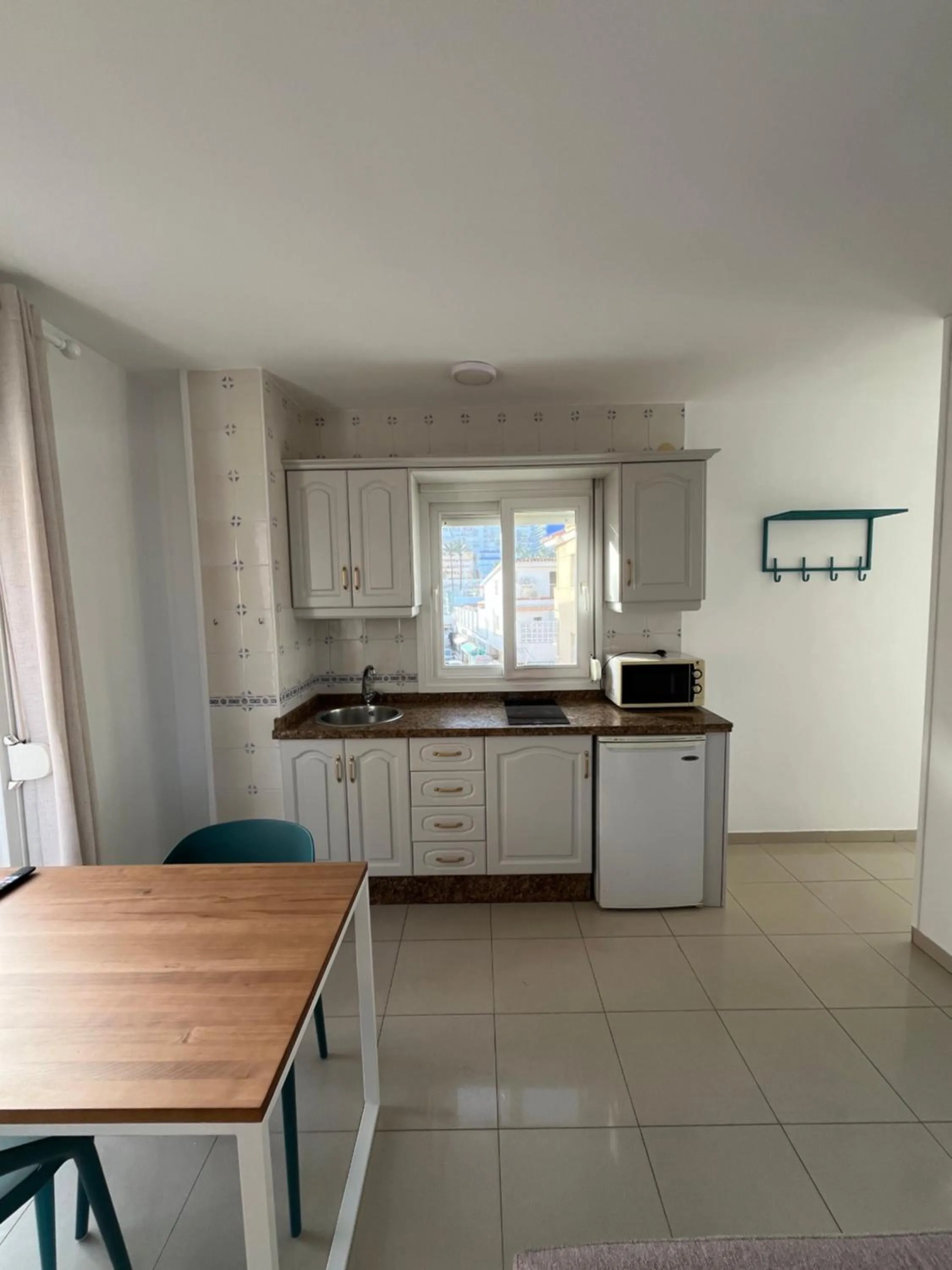 Kitchen or kitchenette in Apartamentos La Proa
