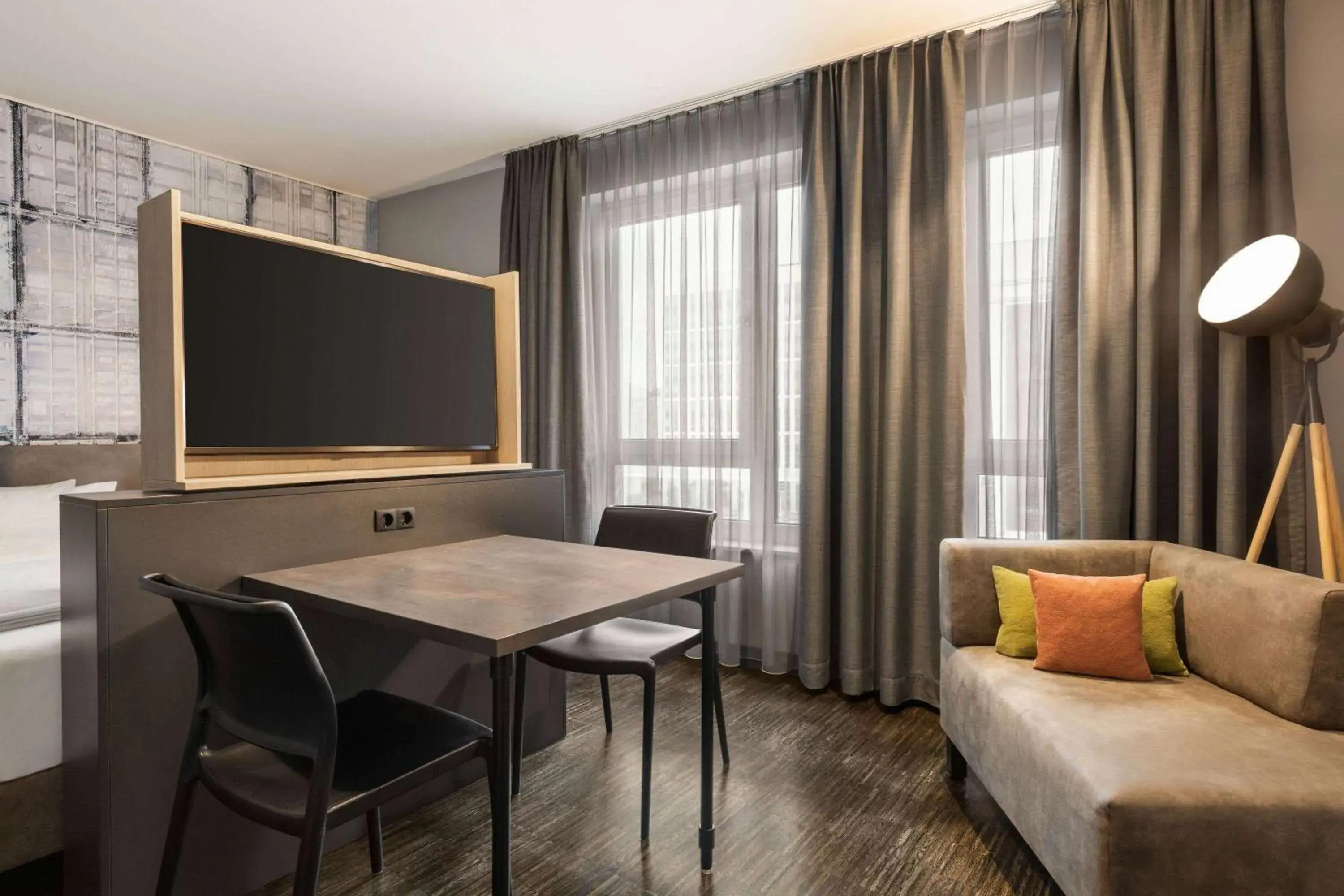 Photo of the whole room in Vienna House Easy by Wyndham Bremen City Apartments Photo of the whole room in Vienna House Easy by Wyndham Bremen City Apartments