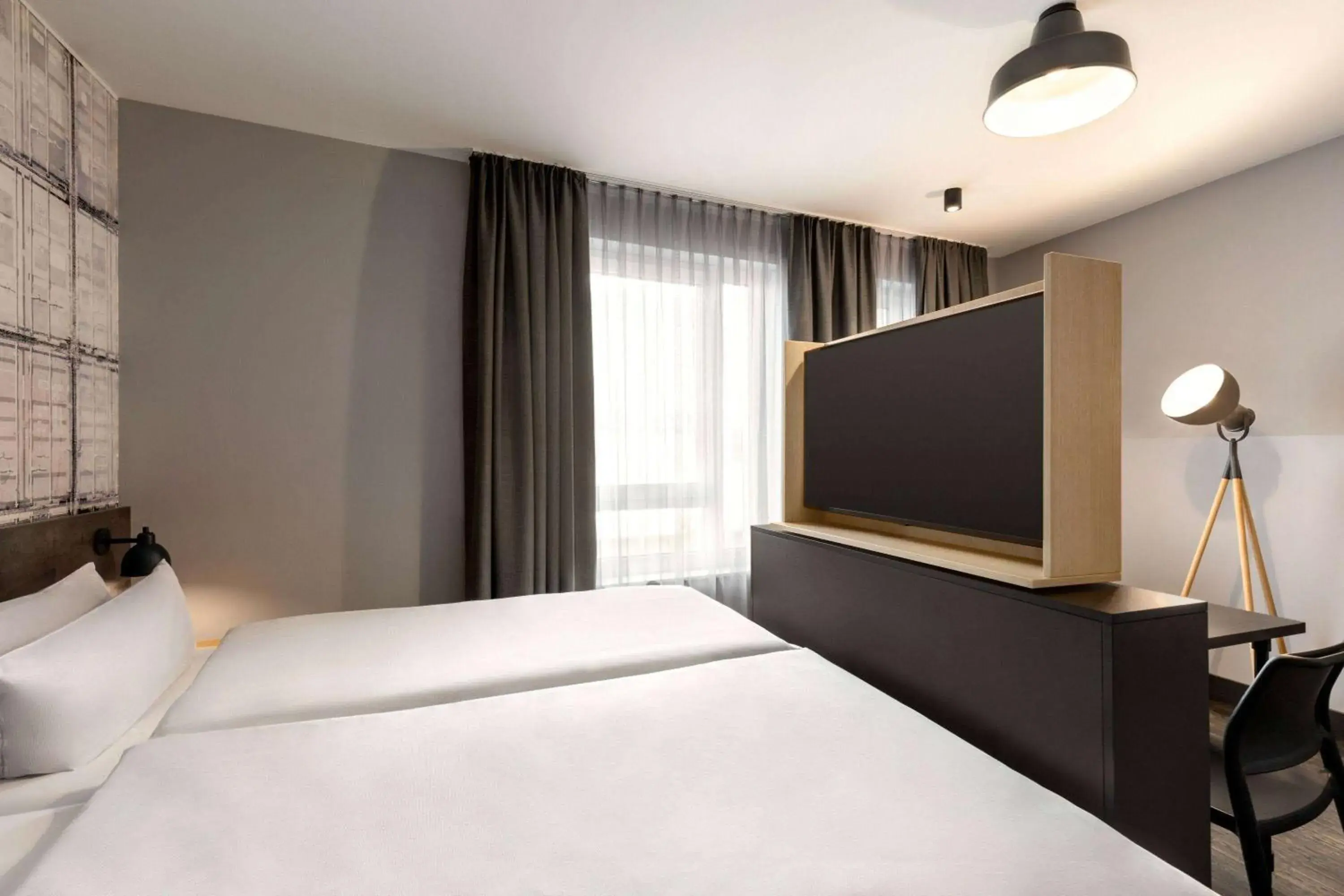 Photo of the whole room, Bed in Vienna House Easy by Wyndham Bremen City Apartments Photo of the whole room, Bed in Vienna House Easy by Wyndham Bremen City Apartments