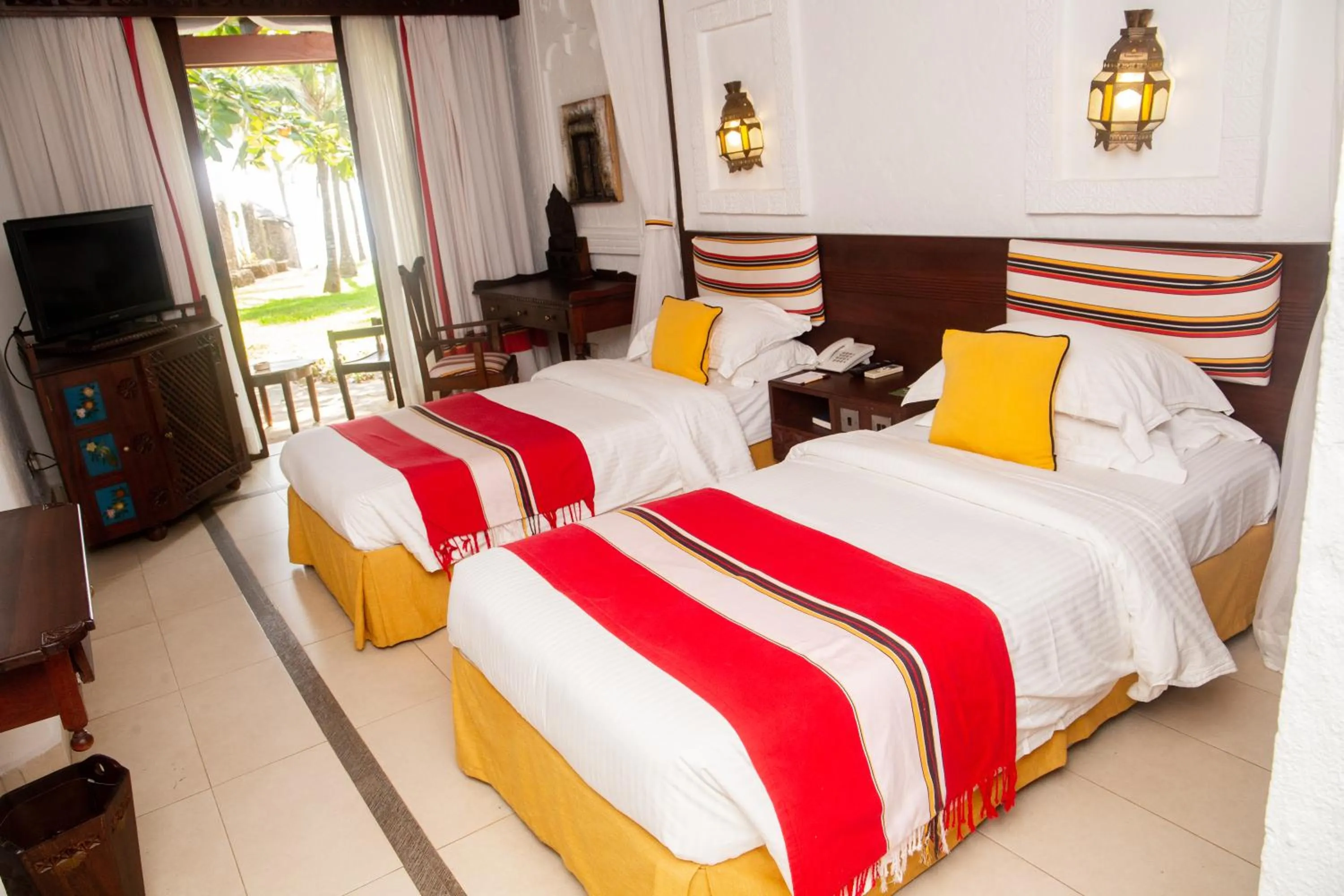 Bed in Serena Beach Resort & Spa