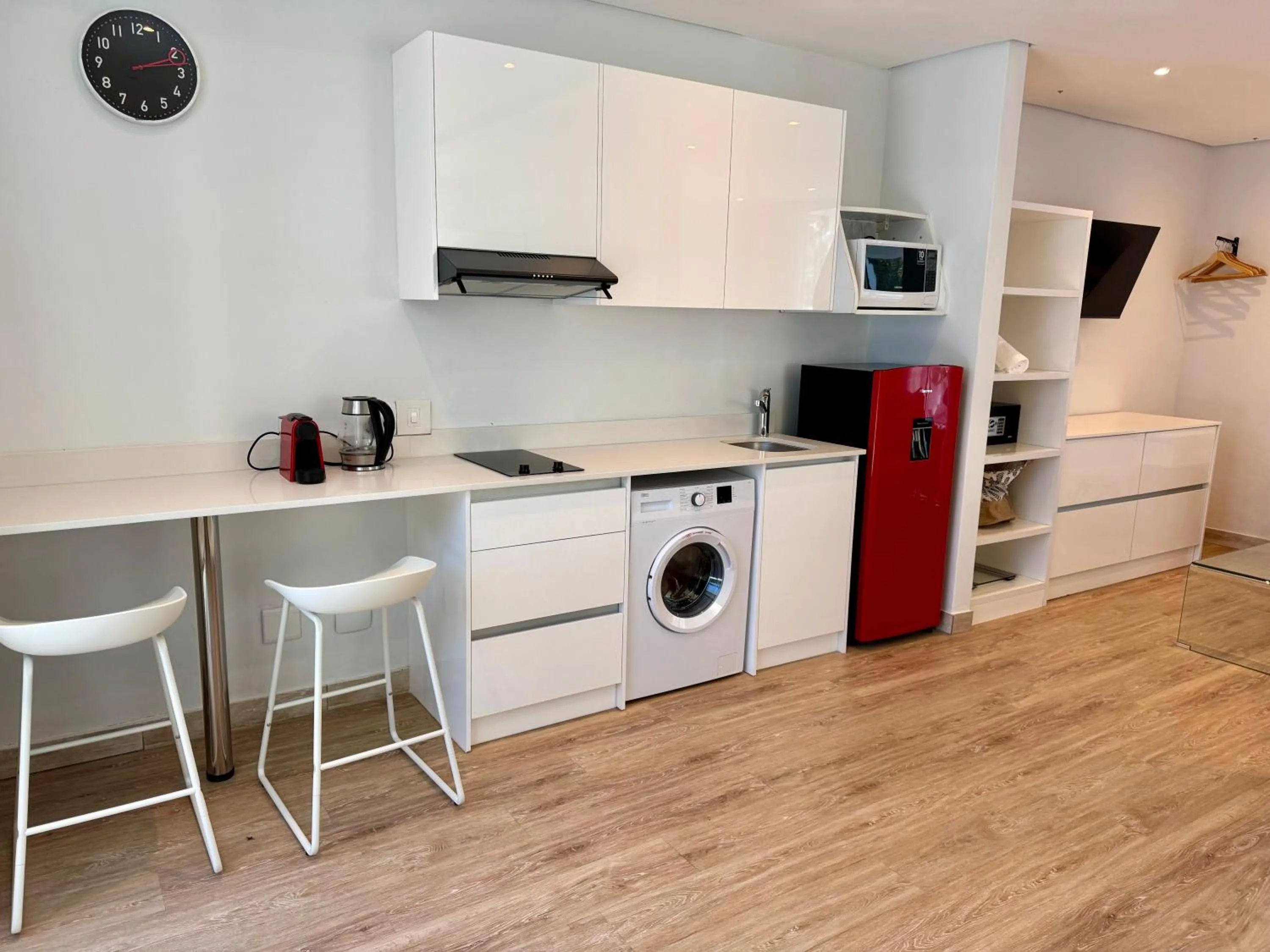Kitchen or kitchenette in Peach on Beach Boutique Guesthouse