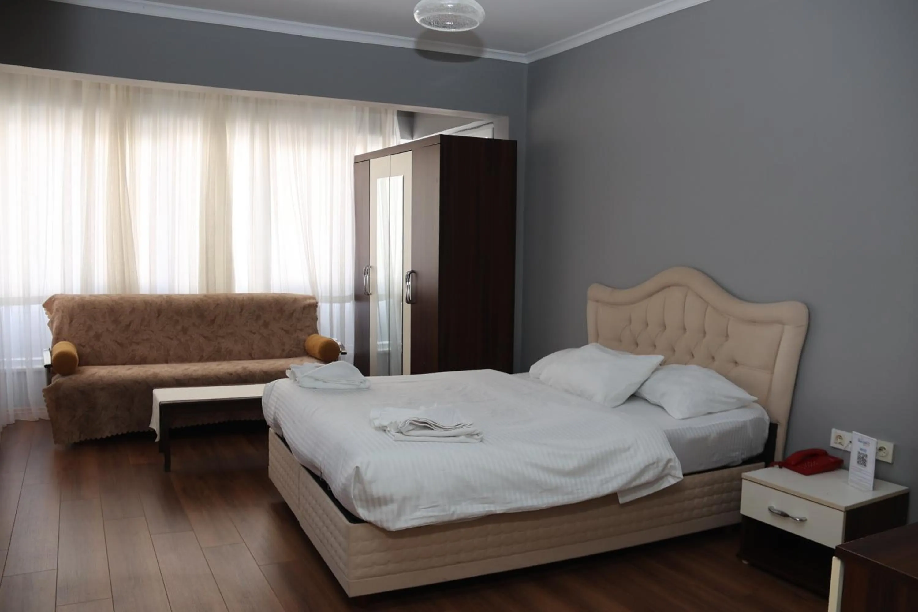 Photo of the whole room, Bed in Grand Koru Hotel Beach